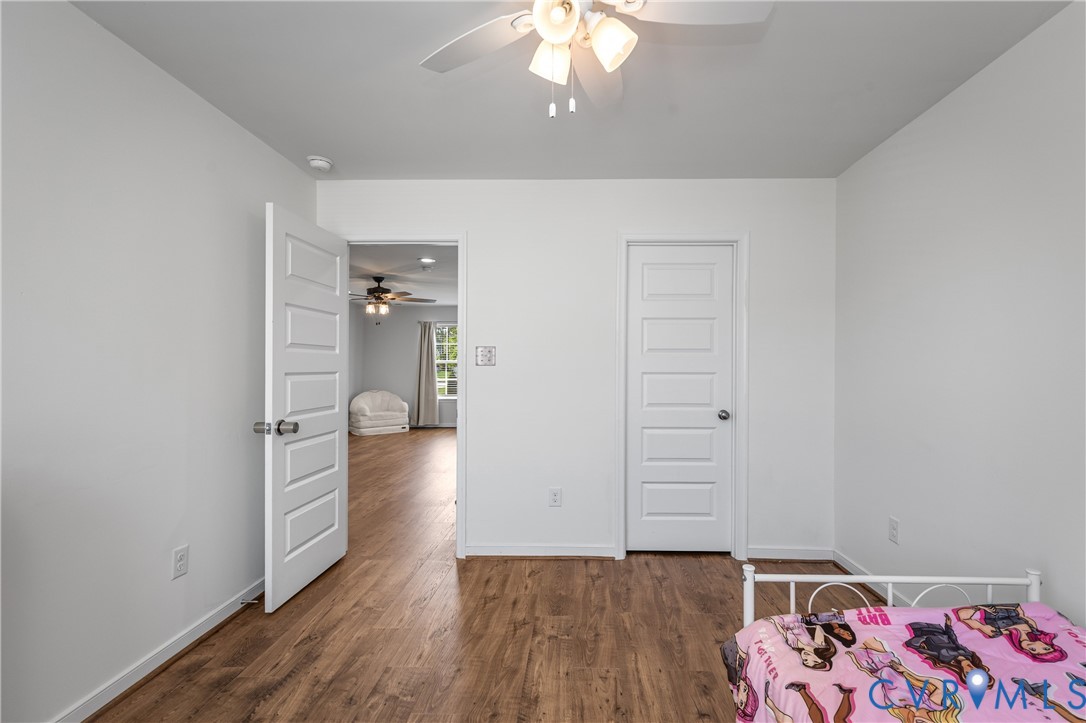 8200 Timberstone Drive Chesterfield, VA 23832 - Photo 36 of 42 wooden floor in a hall with an empty room