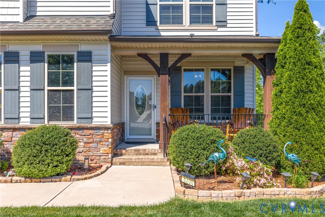 8200 Timberstone Drive Chesterfield, VA 23832 - Photo 40 of 42 front view of a brick house with a large window