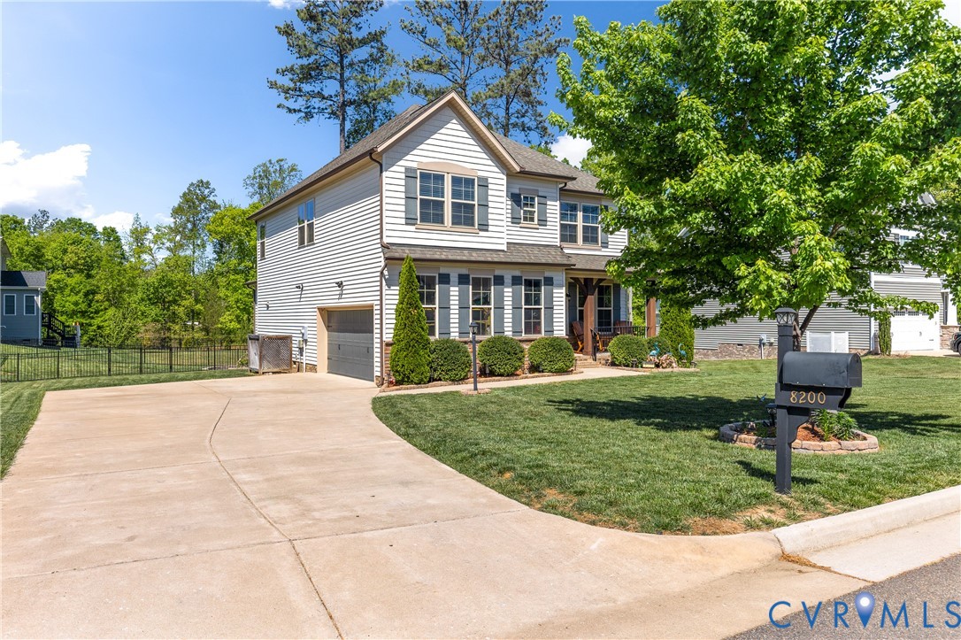 8200 Timberstone Drive Chesterfield, VA 23832 - Photo 41 of 42 a front view of a house with a yard