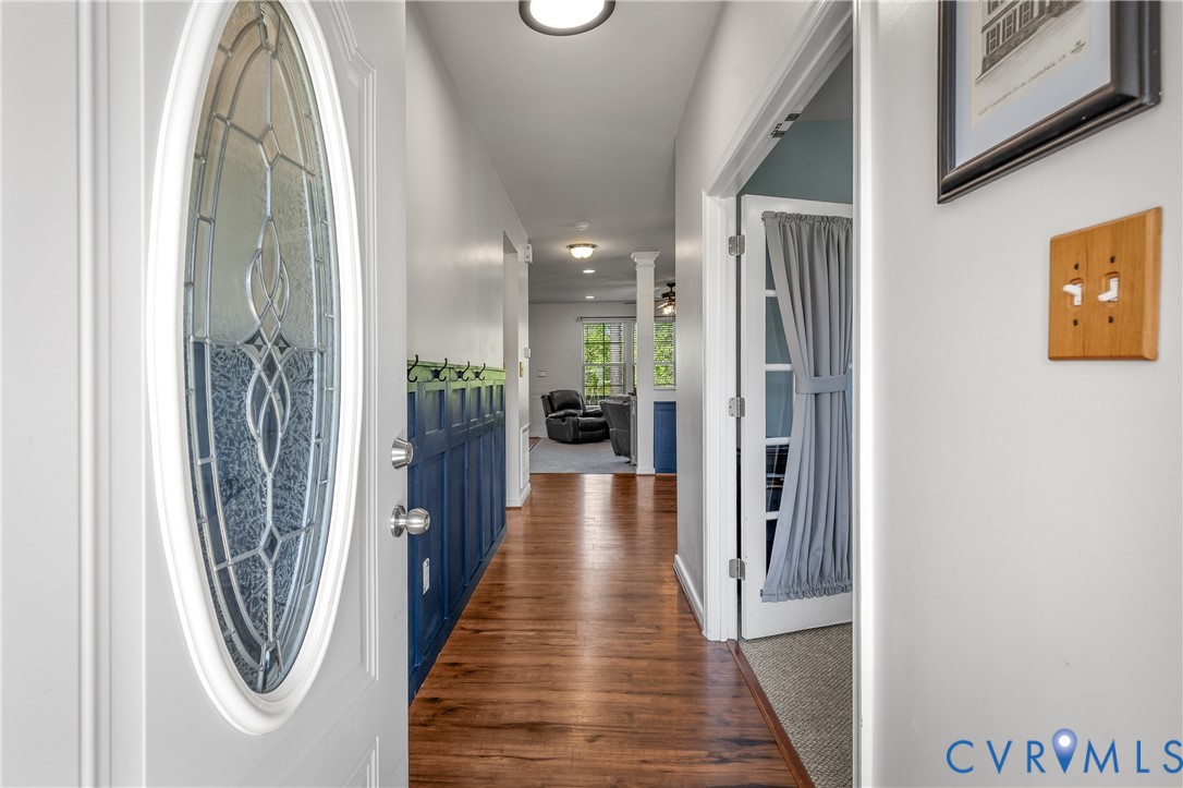 8200 Timberstone Drive Chesterfield, VA 23832 - Photo 6 of 42 a view of a hallway with wooden floor