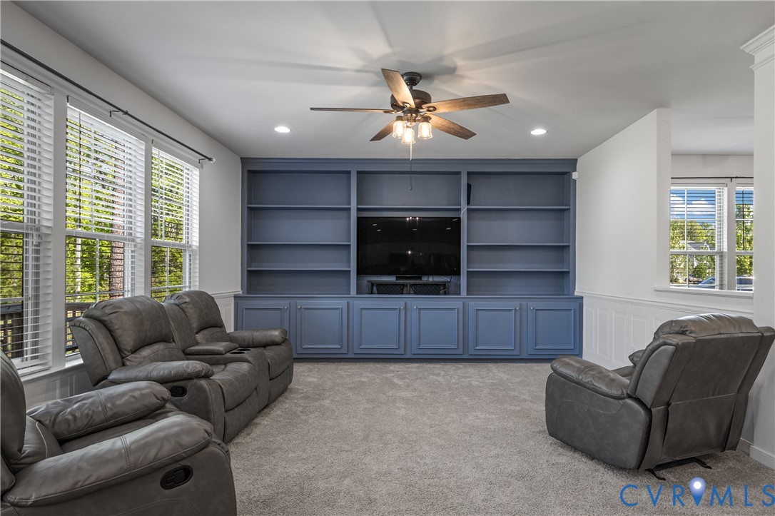 8200 Timberstone Drive Chesterfield, VA 23832 - Photo 10 of 42 a living room with furniture and a flat screen tv