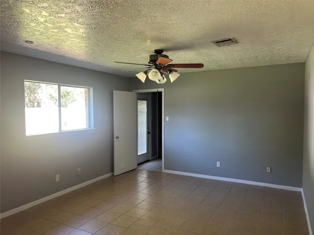 a view of empty room and window