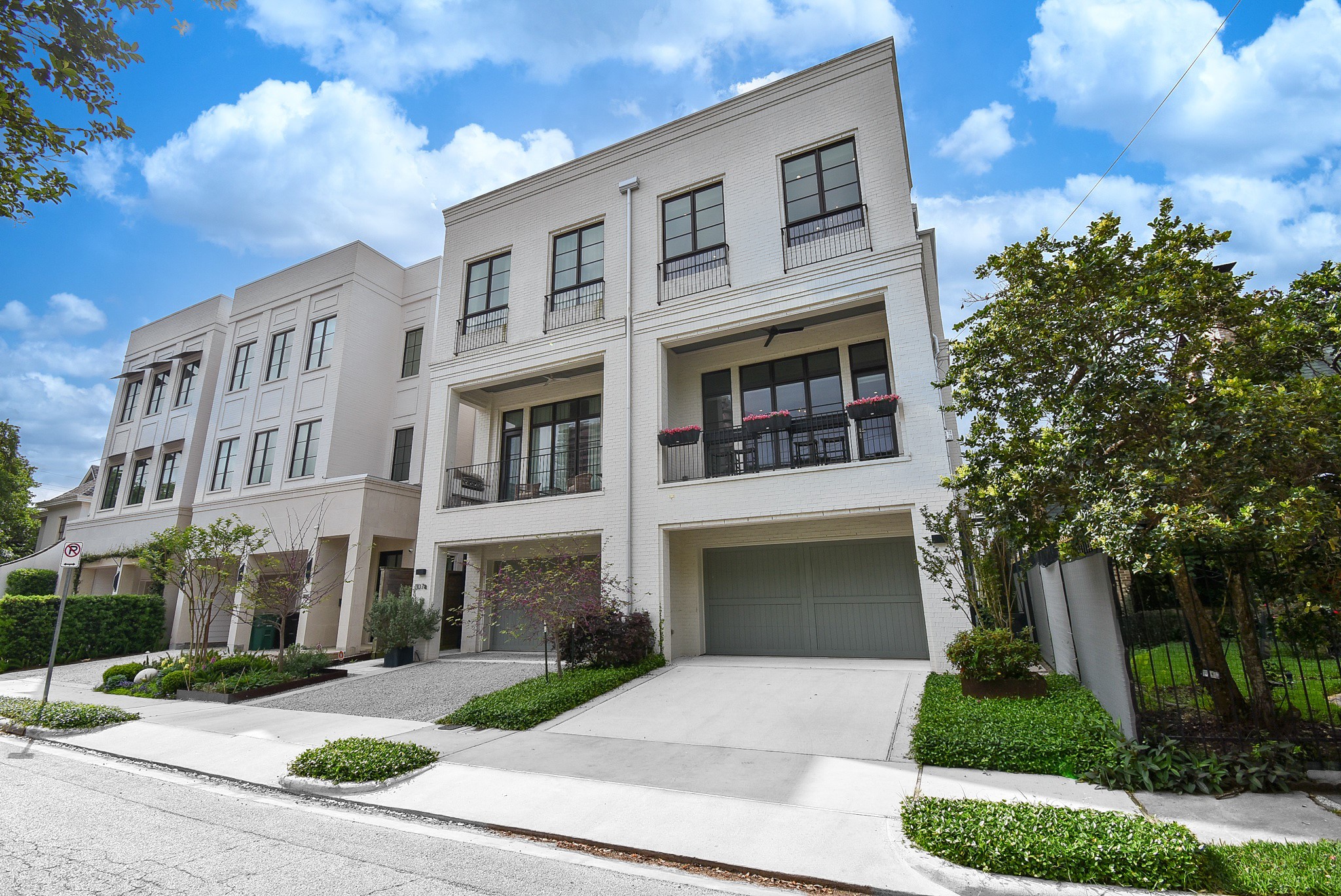 1107 Berthea Street, Unit B Houston, TX 77006 - Photo 2 of 50 a front view of a residential houses with yard
