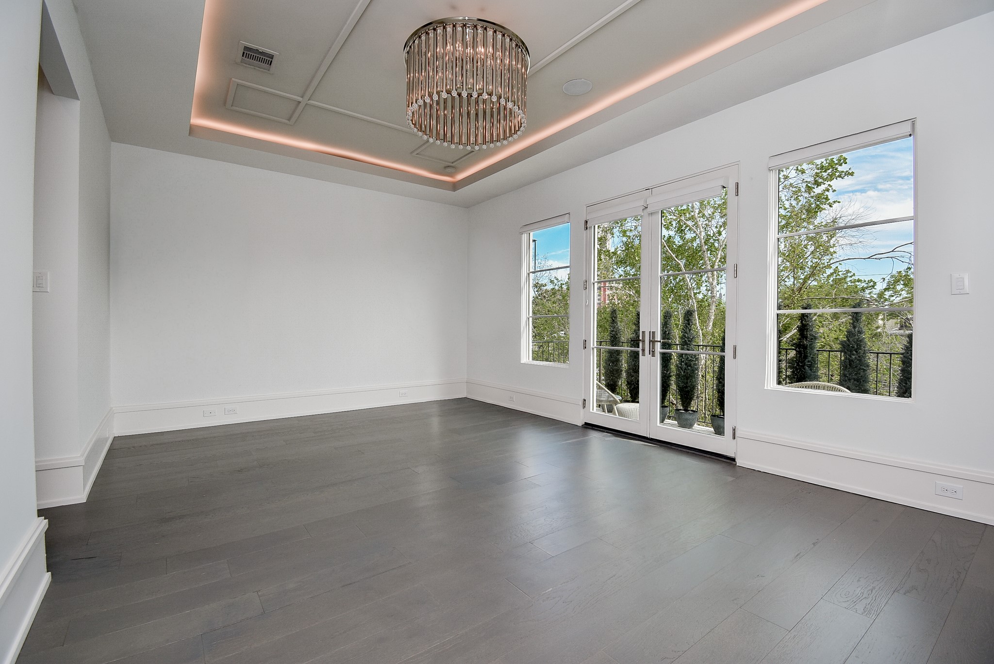 1107 Berthea Street, Unit B Houston, TX 77006 - Photo 34 of 50 a view of an entryway with wooden floor
