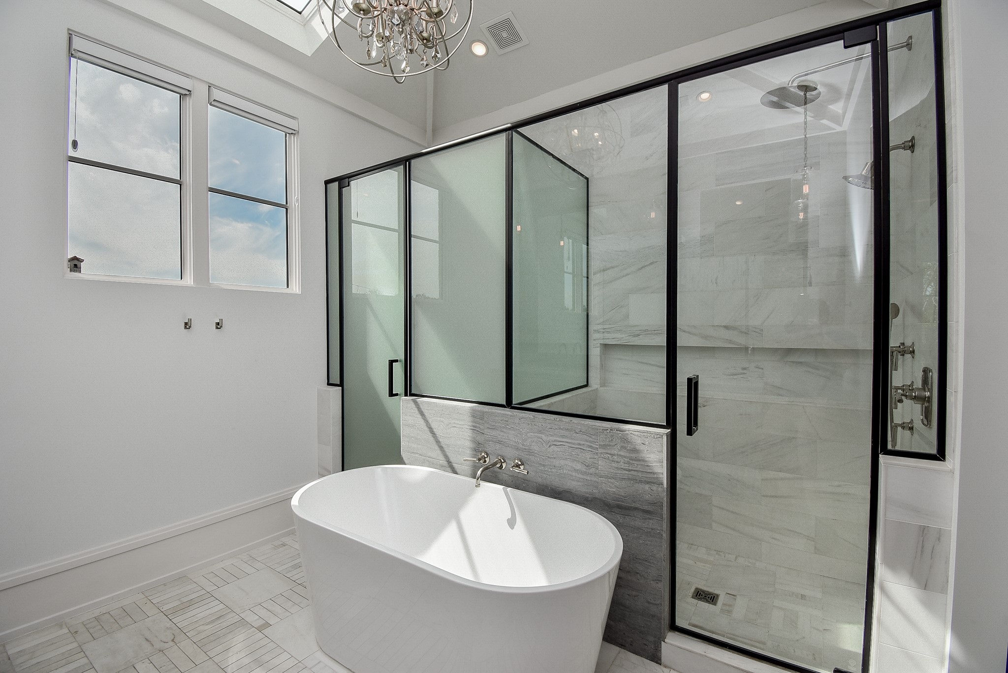 1107 Berthea Street, Unit B Houston, TX 77006 - Photo 36 of 50 a bathroom with a bathtub and a shower