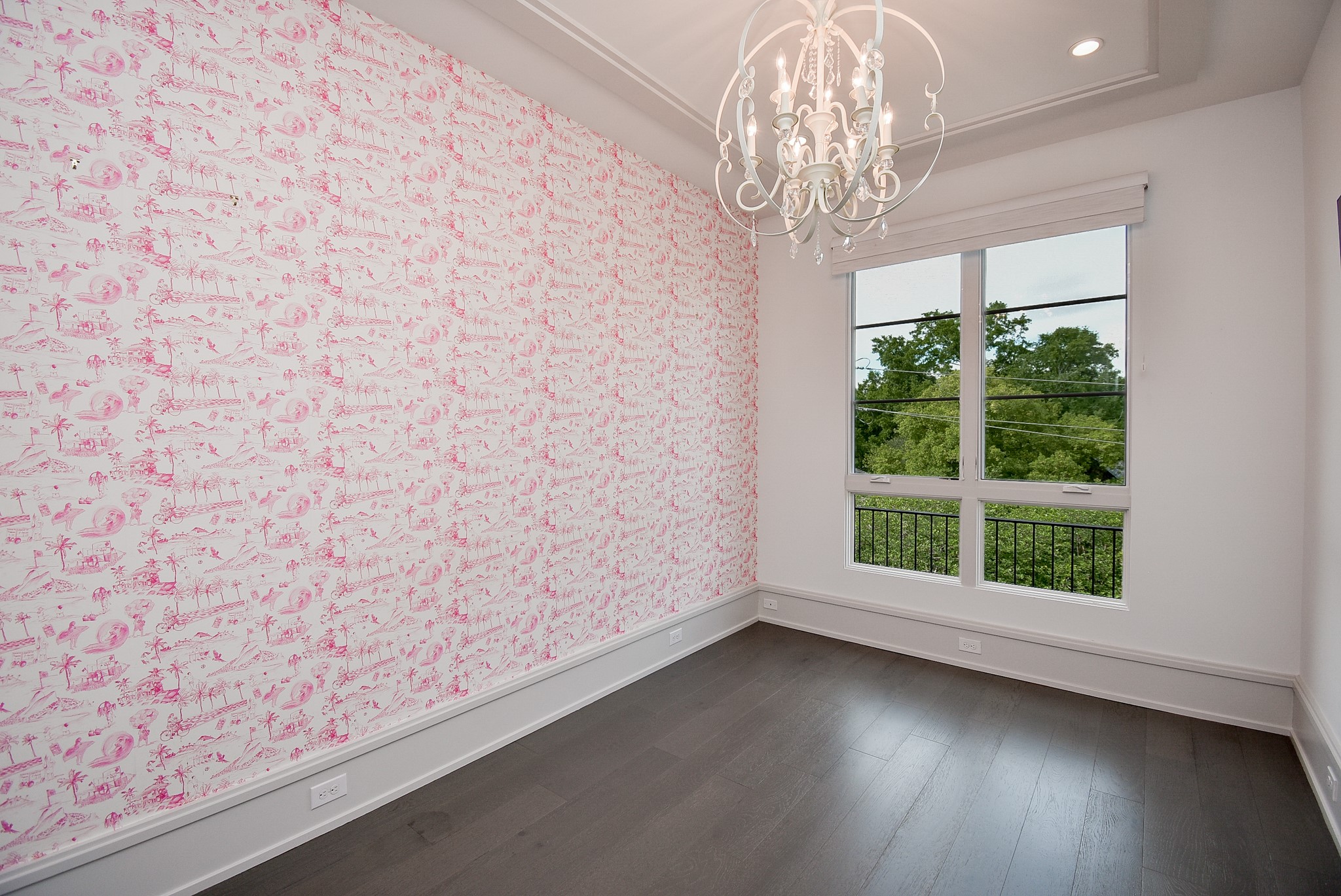 1107 Berthea Street, Unit B Houston, TX 77006 - Photo 40 of 50 a view of a livingroom with wooden floor and a large window