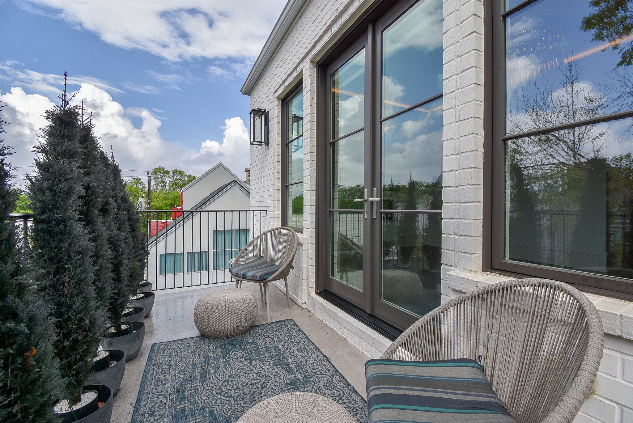 1107 Berthea Street, Unit B Houston, TX 77006 - Photo 47 of 50 a view of a balcony with couch