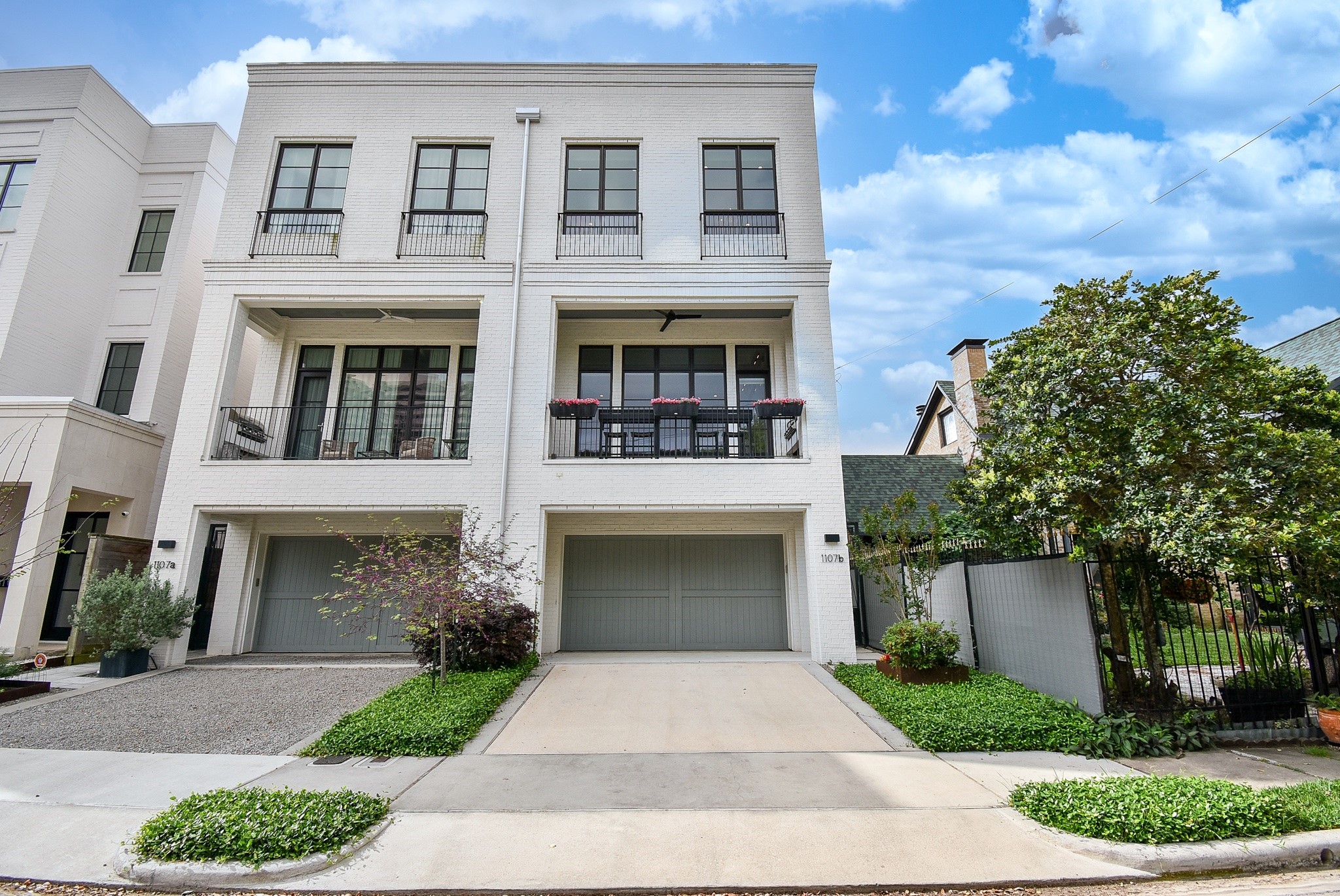 1107 Berthea Street, Unit B Houston, TX 77006 - Photo 49 of 50 a front view of a house with yard
