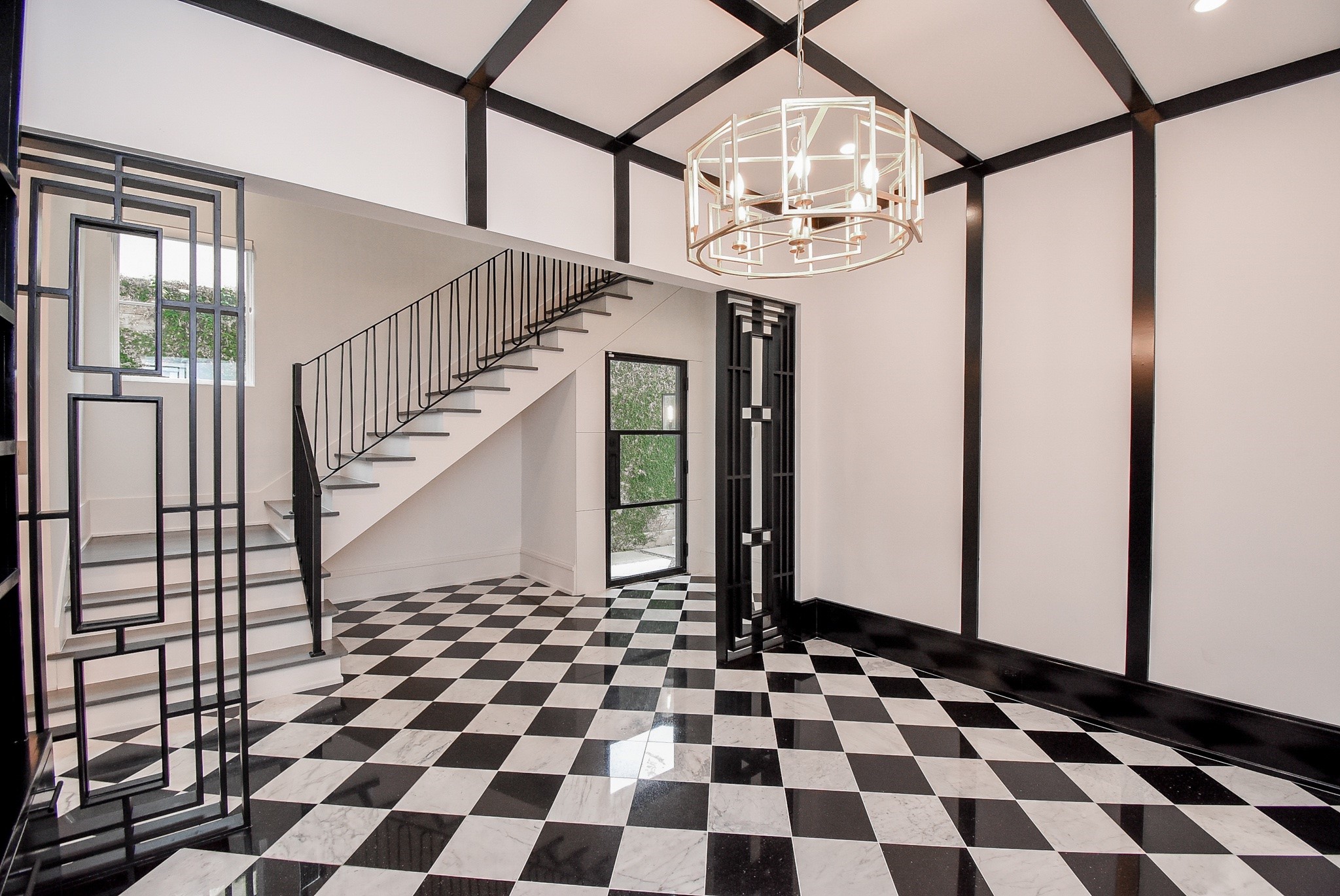 1107 Berthea Street, Unit B Houston, TX 77006 - Photo 5 of 50 a black and white checkered floor
