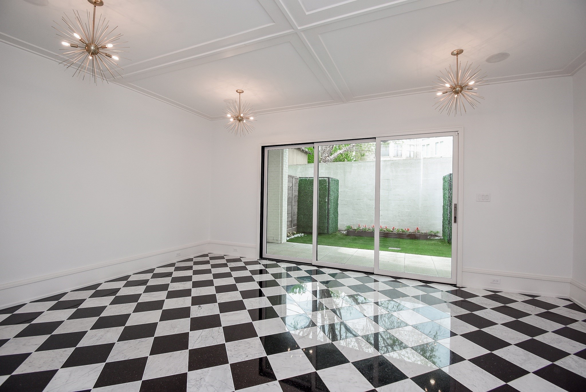 1107 Berthea Street, Unit B Houston, TX 77006 - Photo 9 of 50 a black and white checkered floor with a large window