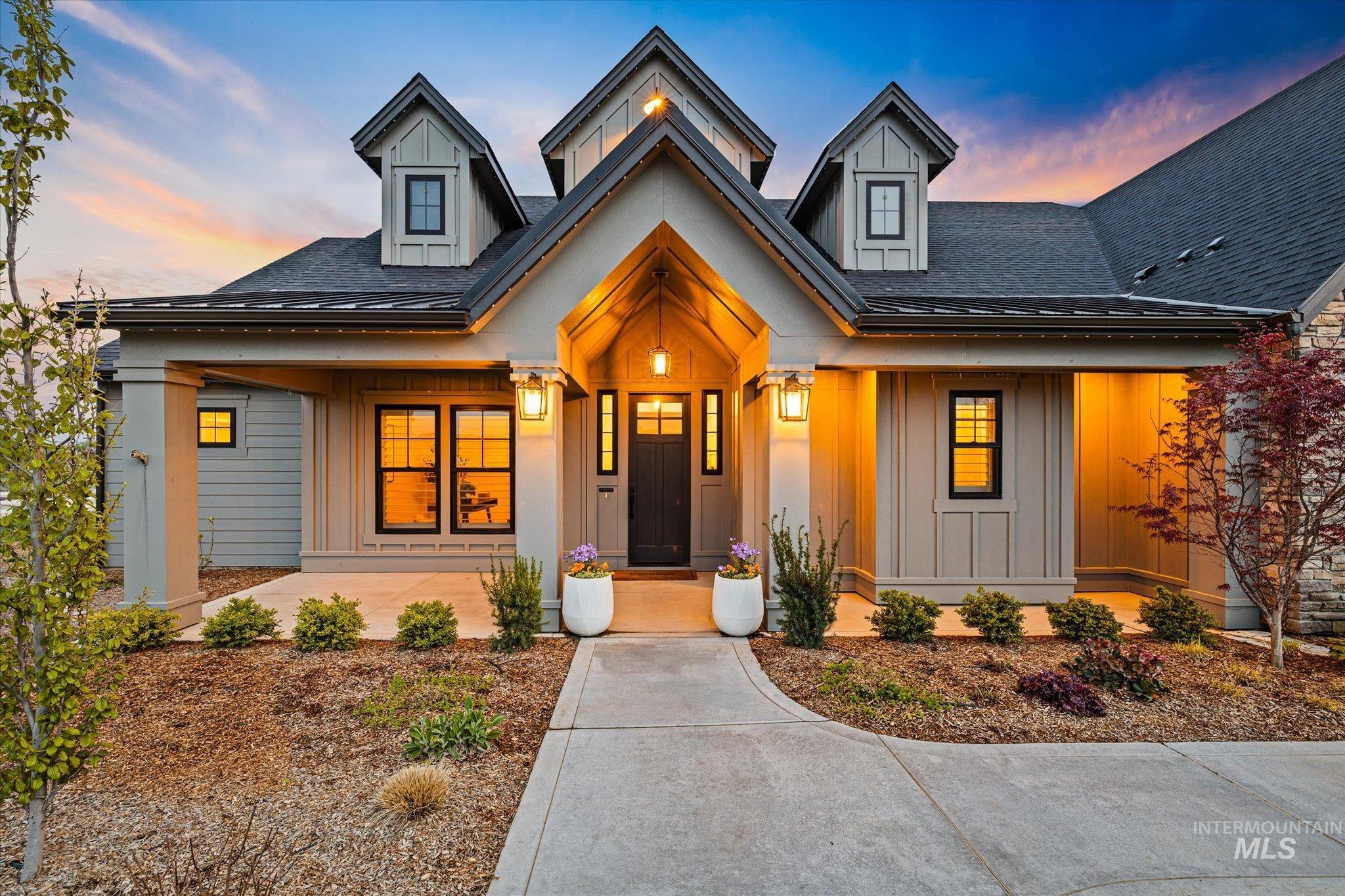 14857 Elk Spg Street Caldwell, ID 83607 - Photo 2 of 40 Modern farmhouse featuring board and batten siding, roof with shingles, and a porch