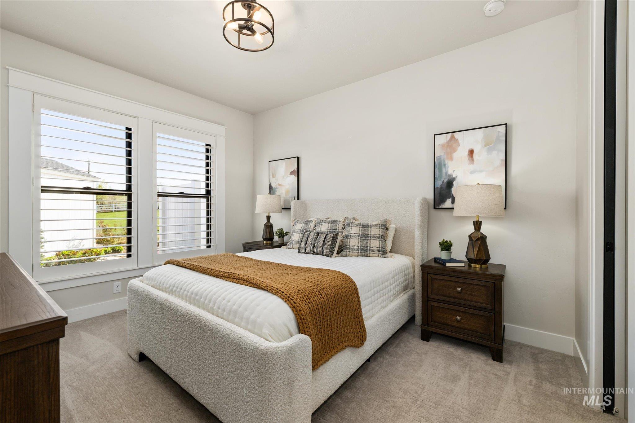 14857 Elk Spg Street Caldwell, ID 83607 - Photo 21 of 40 Bedroom featuring baseboards and carpet flooring
