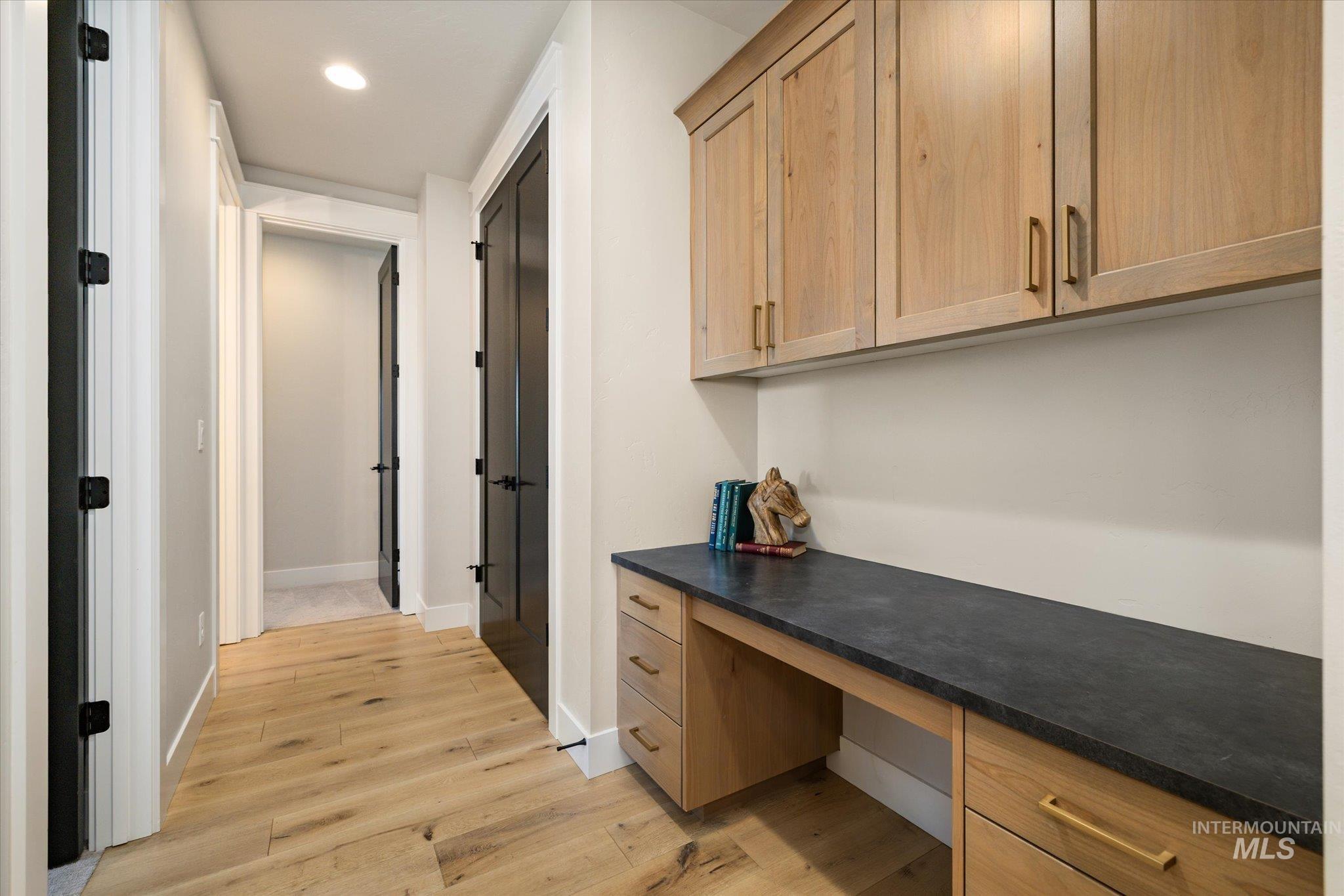 14857 Elk Spg Street Caldwell, ID 83607 - Photo 23 of 40 Unfurnished office featuring built in study area, light wood-type flooring, and recessed lighting