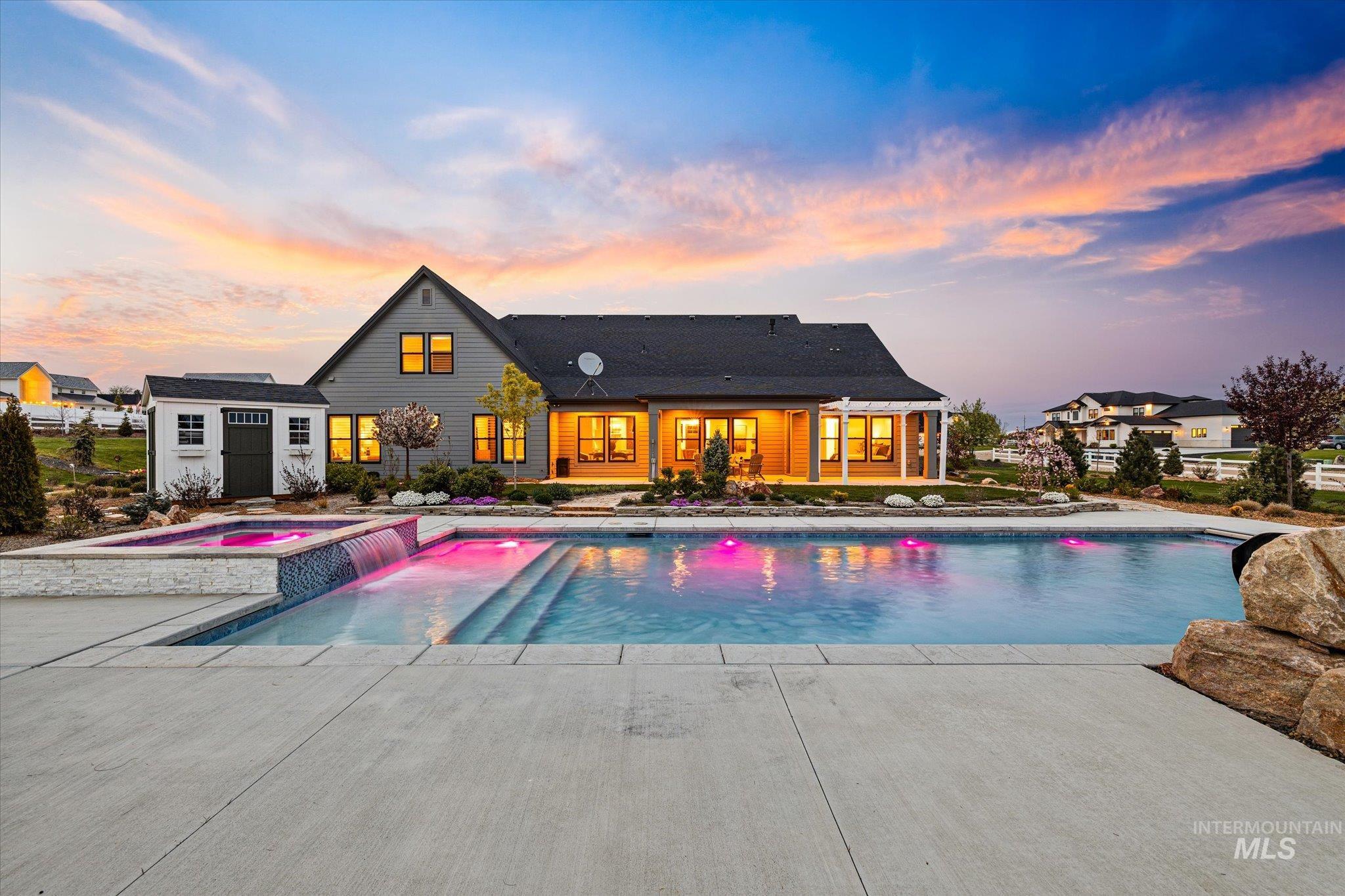 14857 Elk Spg Street Caldwell, ID 83607 - Photo 6 of 40 Integrated pool / hot tub with a patio area and an outbuilding