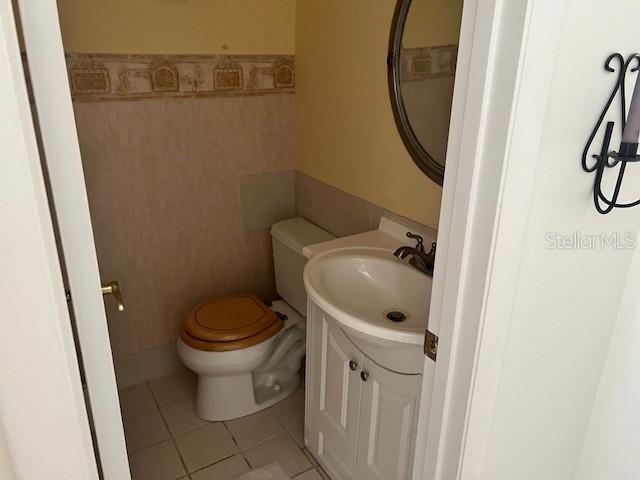 4758 Jasper Drive, Unit 206 New Port Richey, FL 34652 - Photo 6 of 34 a bathroom with a sink and a mirror
