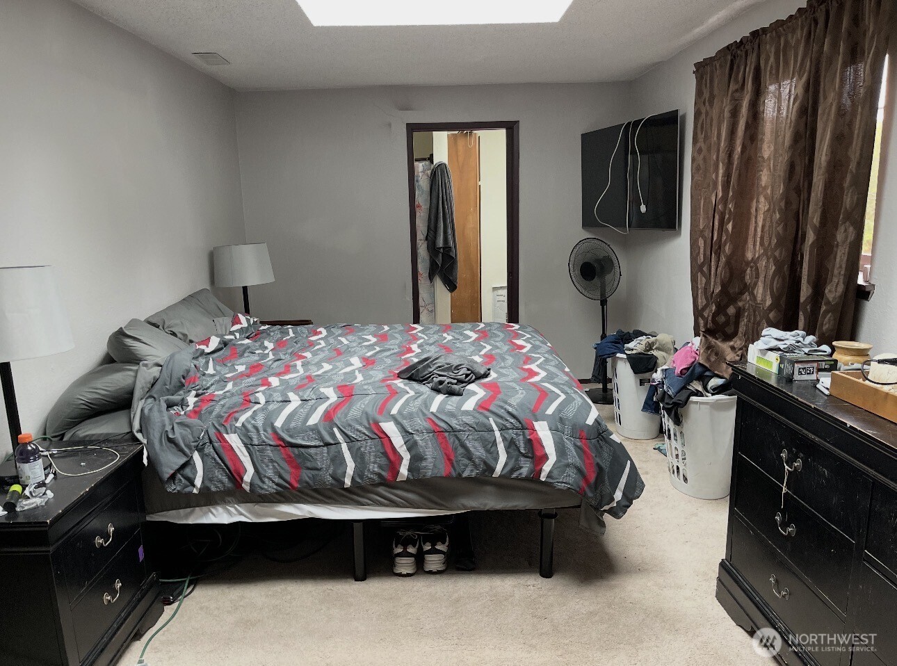 1104 Dibb Street Bremerton, WA 98310 - Photo 6 of 15 a bedroom with a bed and a dresser