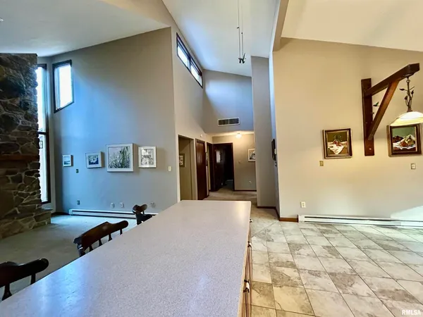 a room with lots of table and chair