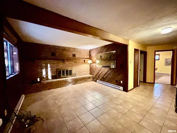 a view of a hallway with a tv