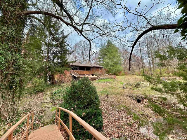 a view of tree in front of a house