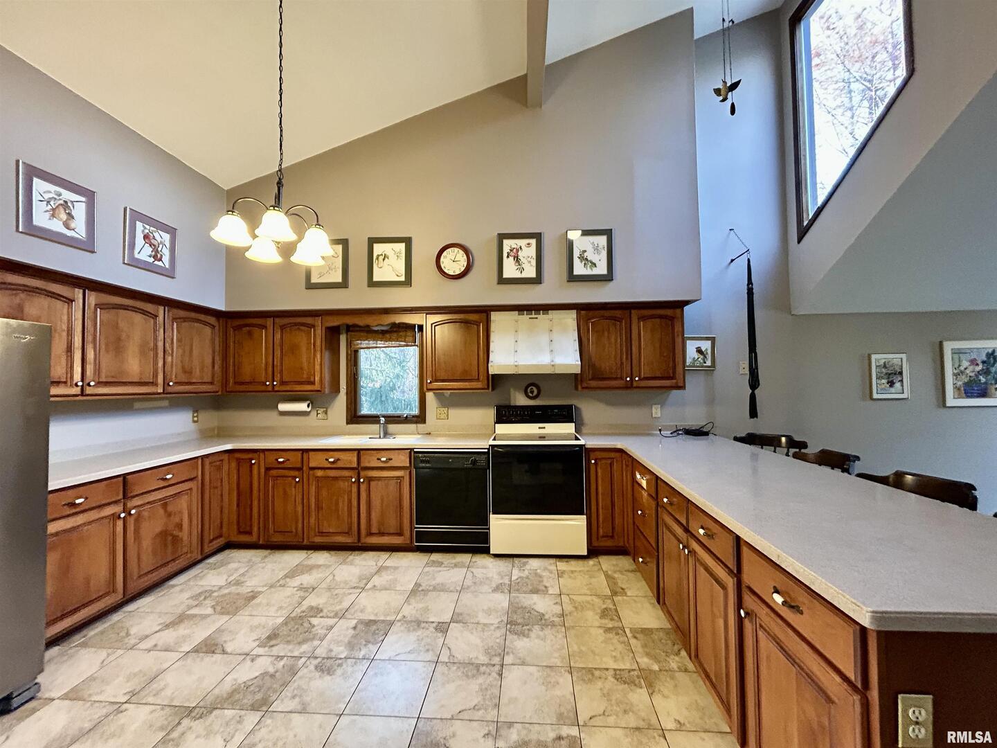 61 Schack Murphysboro, IL 62966 - Photo 9 of 43 a kitchen with stainless steel appliances granite countertop a sink and stove