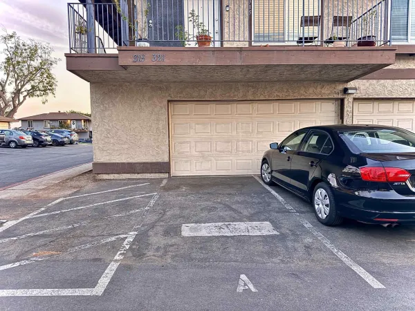 a car parked in front of a house
