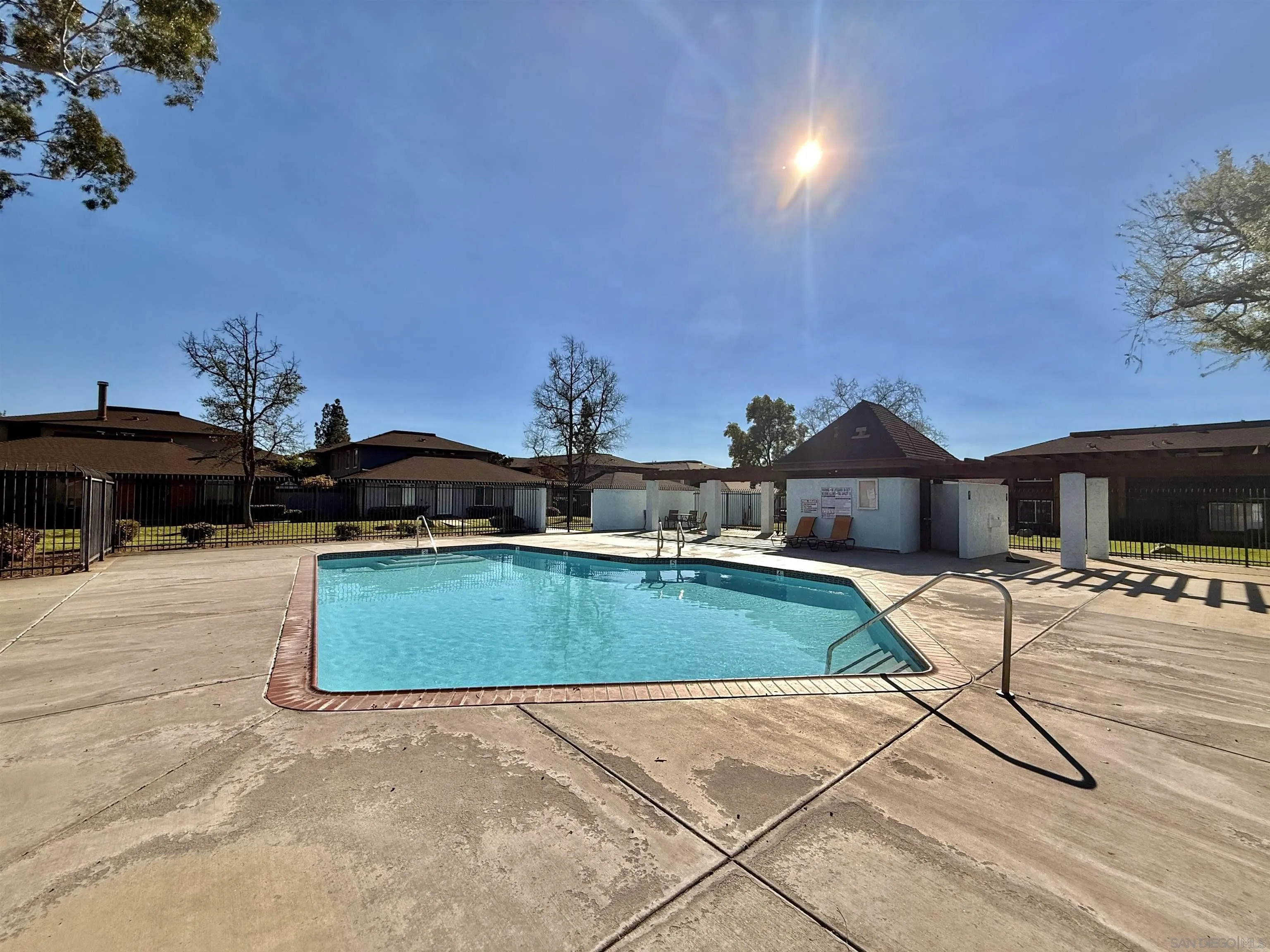 321 Sun Court El Cajon, CA 92021 - Photo 25 of 33 a view of a swimming pool with an outdoor seating