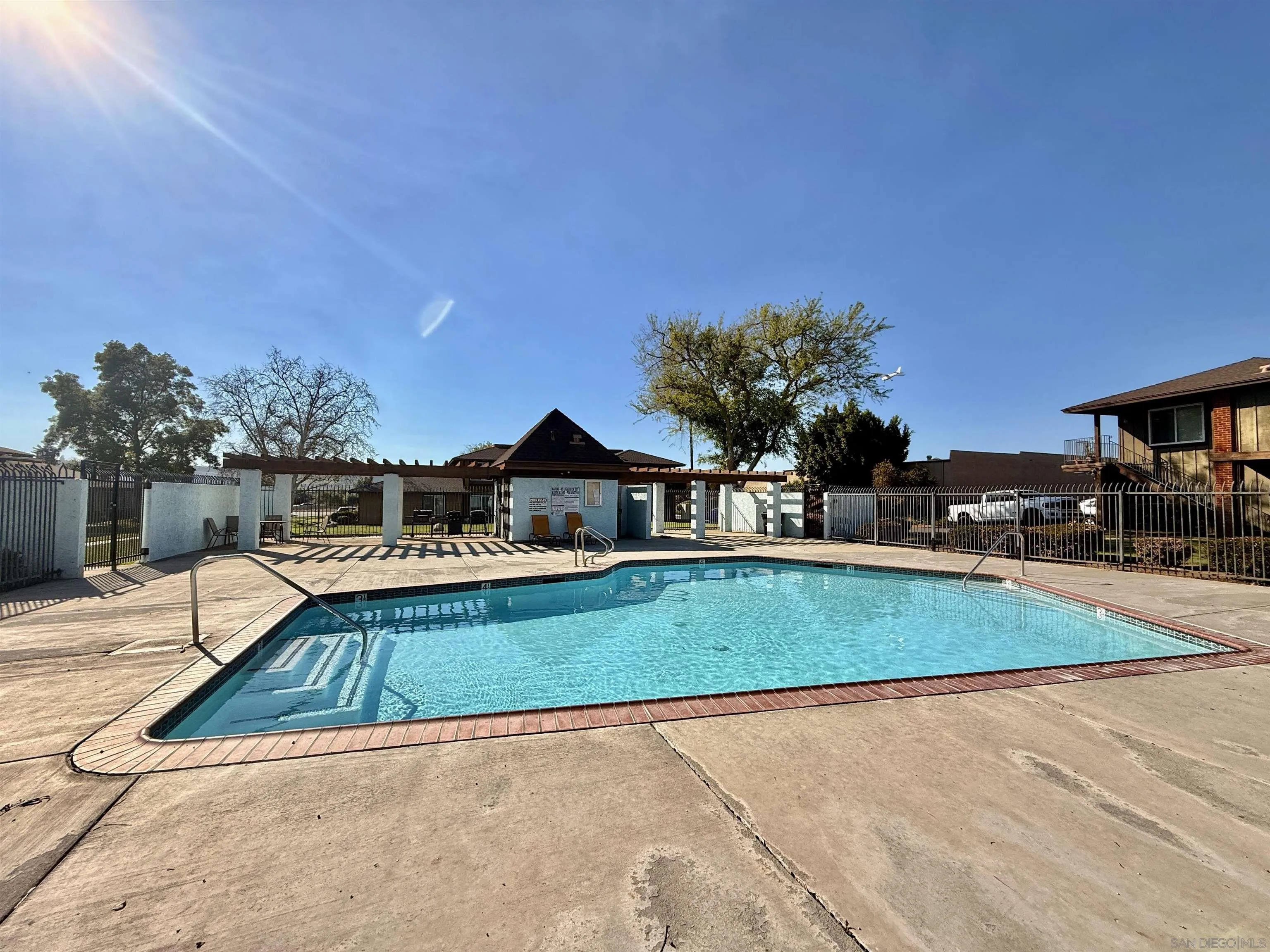 321 Sun Court El Cajon, CA 92021 - Photo 27 of 33 a view of swimming pool with a yard