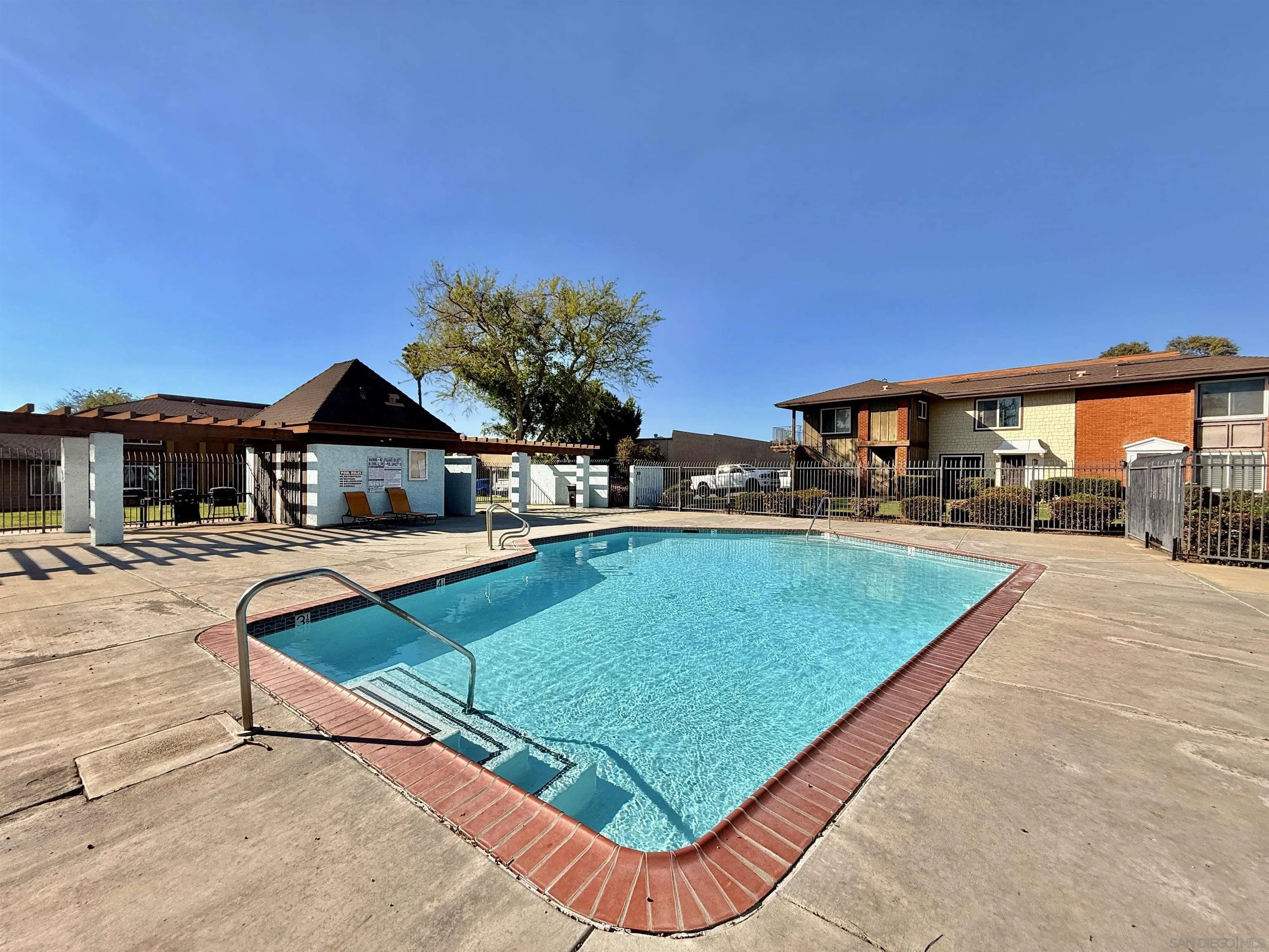 321 Sun Court El Cajon, CA 92021 - Photo 28 of 33 a view of outdoor space yard and swimming pool