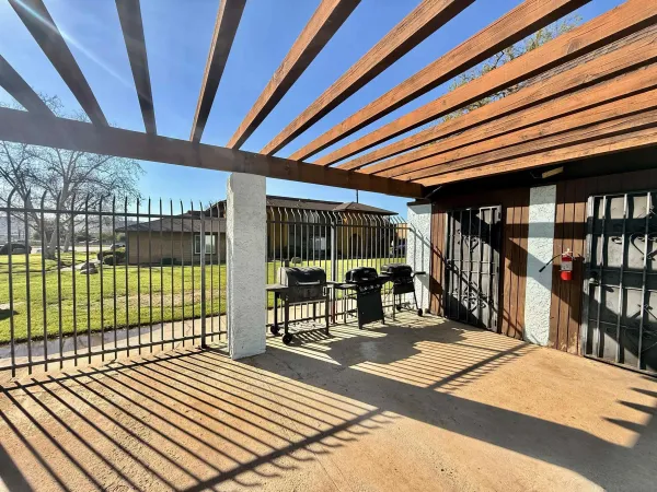 a view of a balcony with furniture