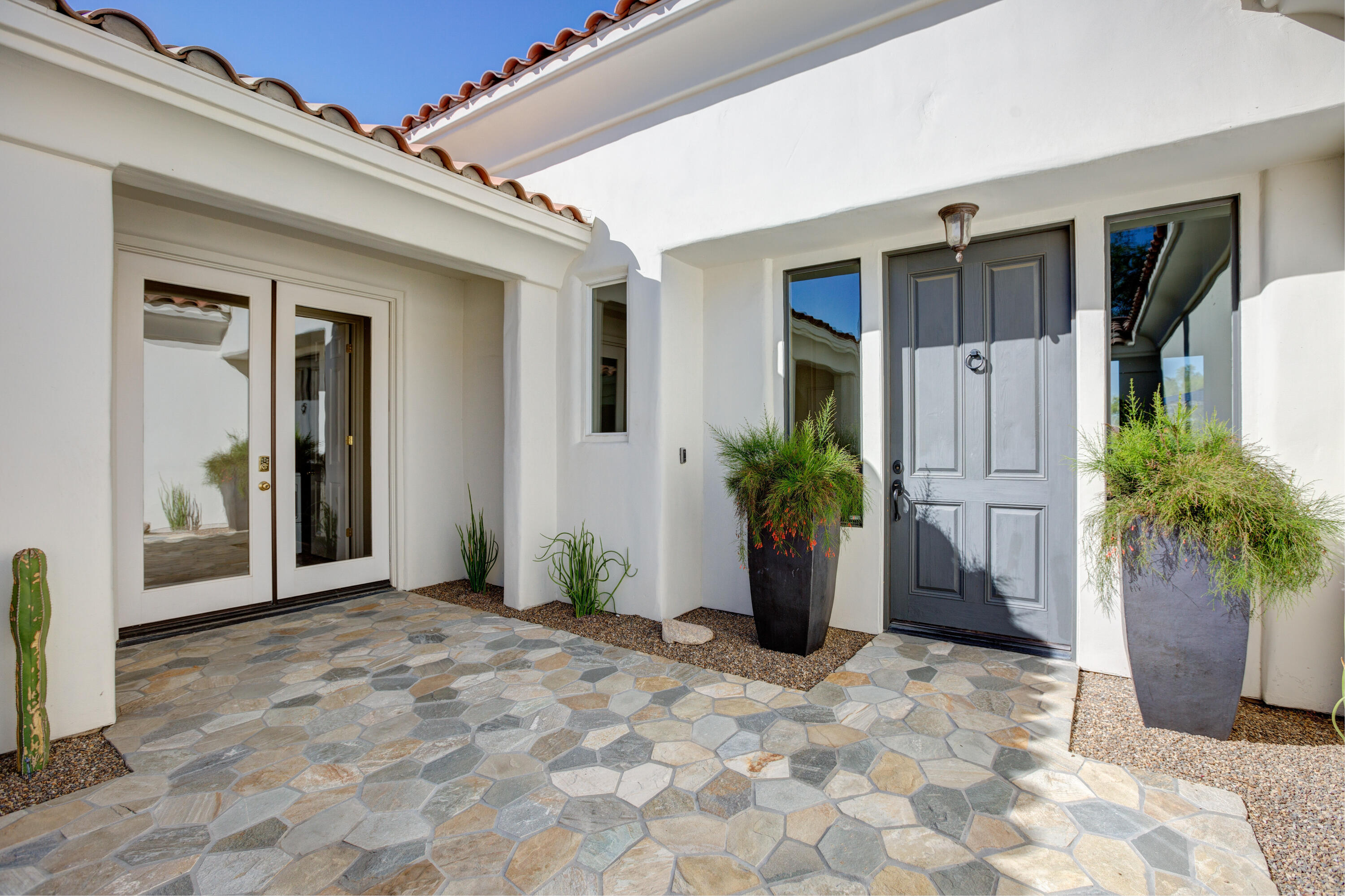 390 Loch Lomond Road Rancho Mirage, CA 92270 - Photo 11 of 55 a view of a entryway door front of house