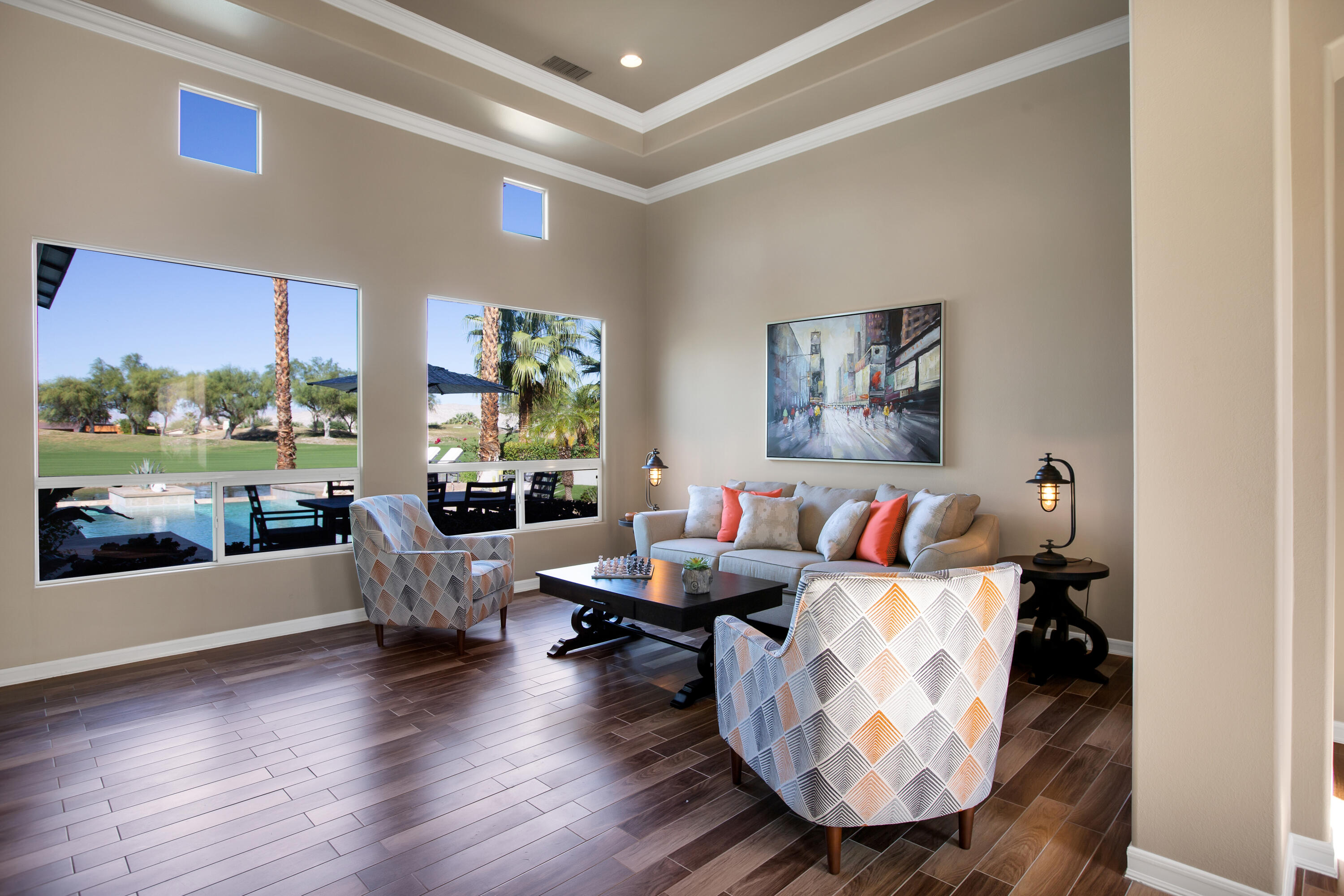 390 Loch Lomond Road Rancho Mirage, CA 92270 - Photo 21 of 55 a living room with furniture and a large window
