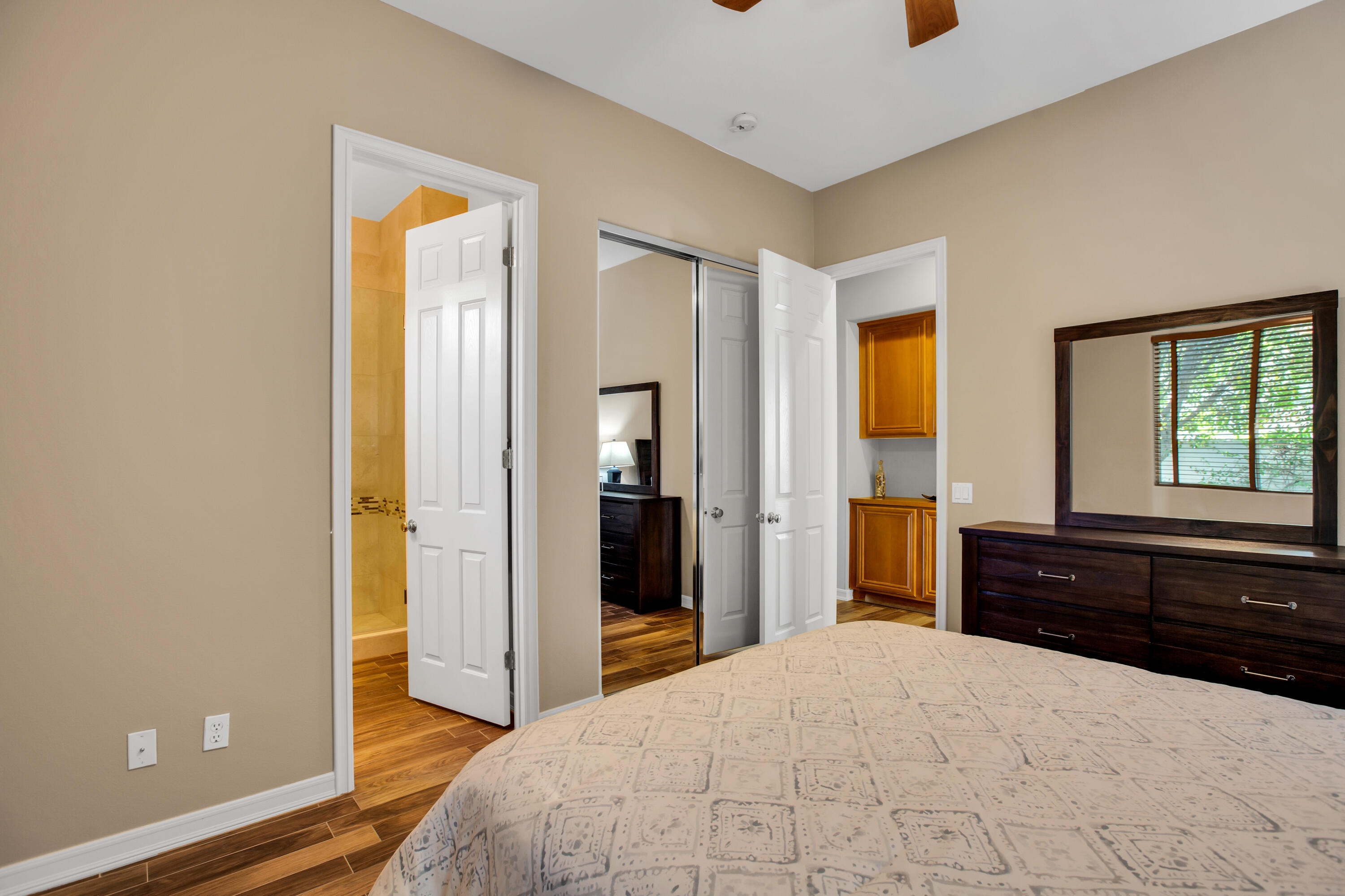 390 Loch Lomond Road Rancho Mirage, CA 92270 - Photo 33 of 55 a bedroom with a bed and a dresser