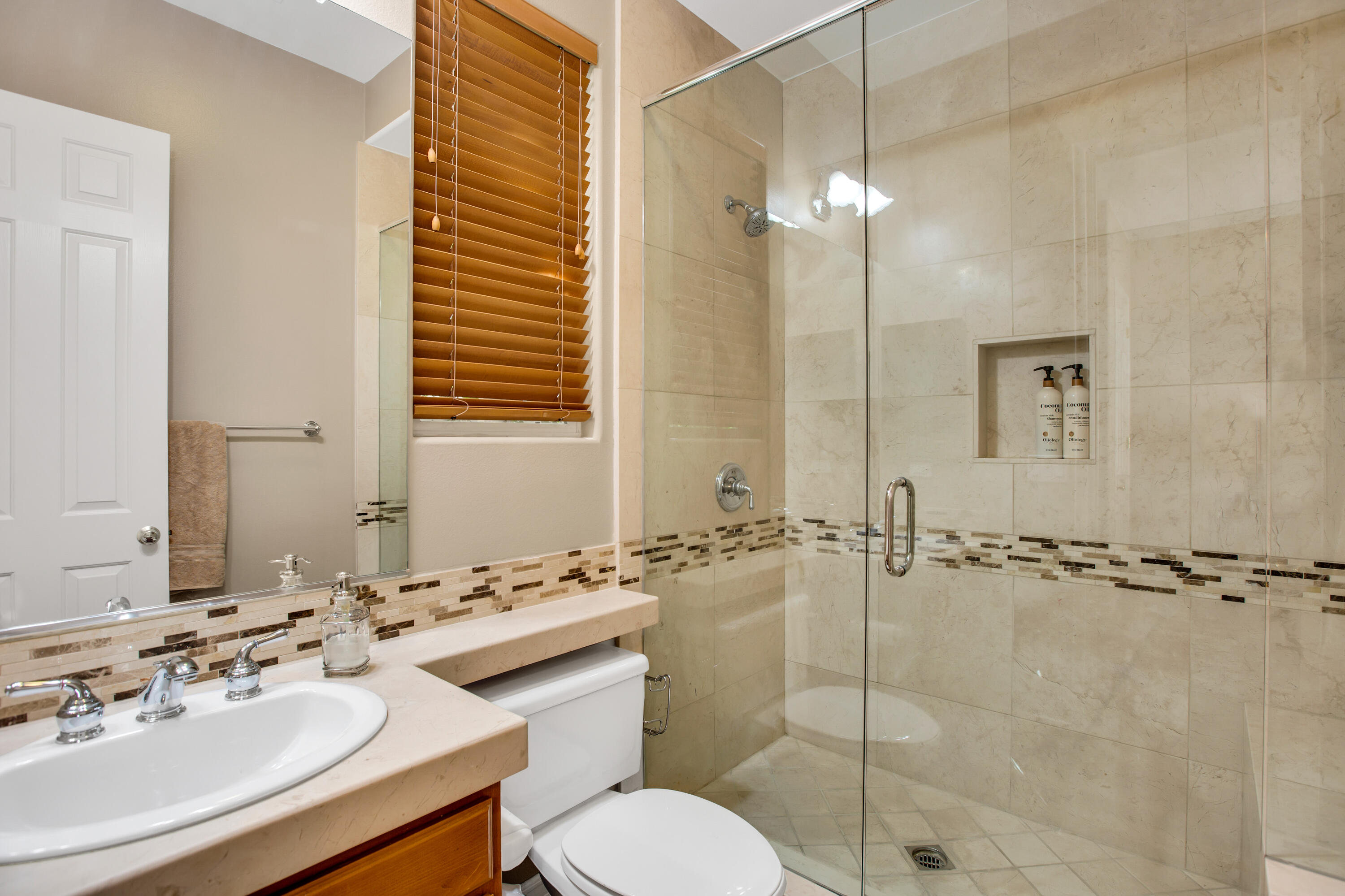 390 Loch Lomond Road Rancho Mirage, CA 92270 - Photo 37 of 55 a bathroom with a sink and a mirror