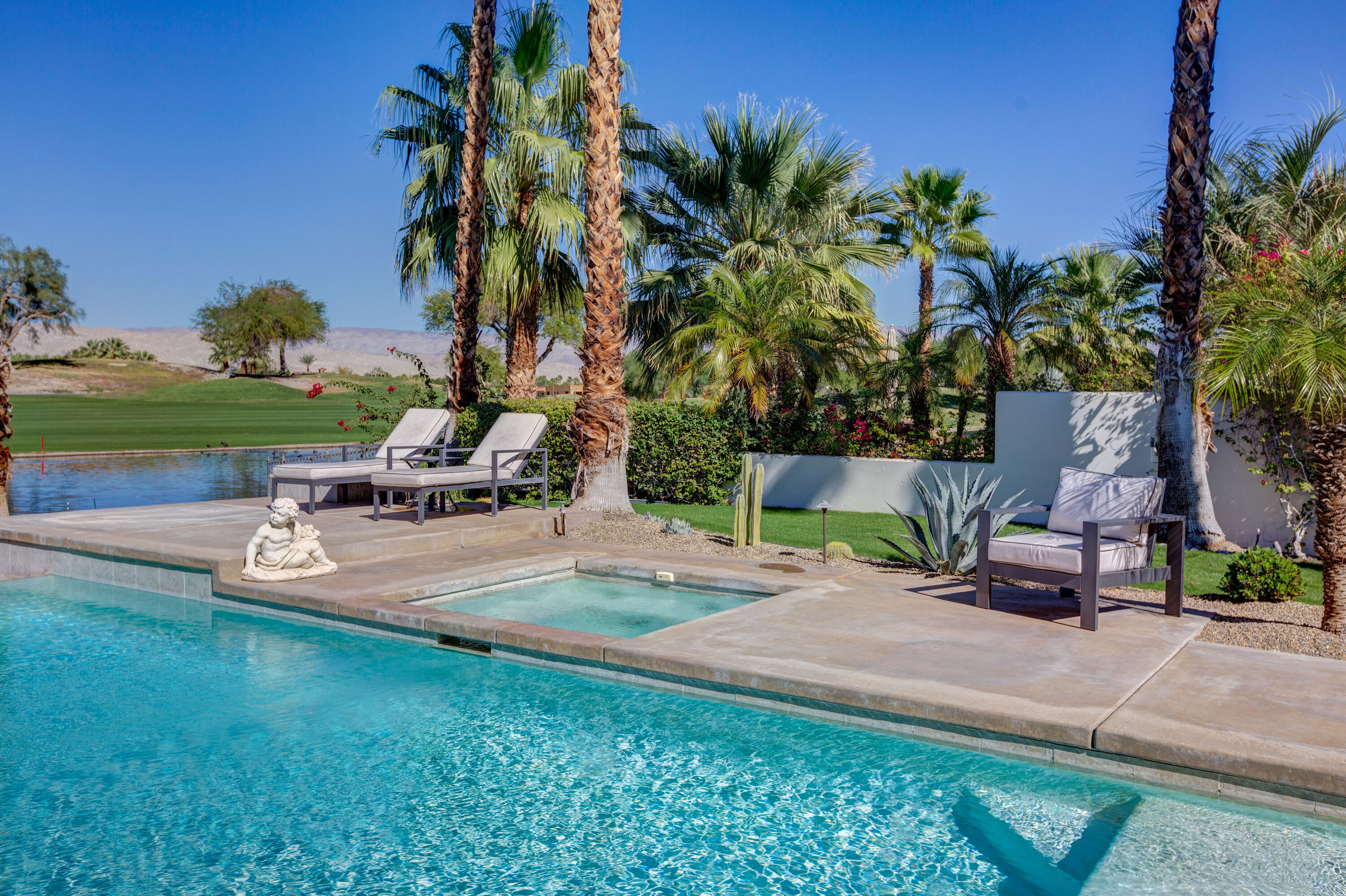 390 Loch Lomond Road Rancho Mirage, CA 92270 - Photo 45 of 55 a view of a backyard with a patio