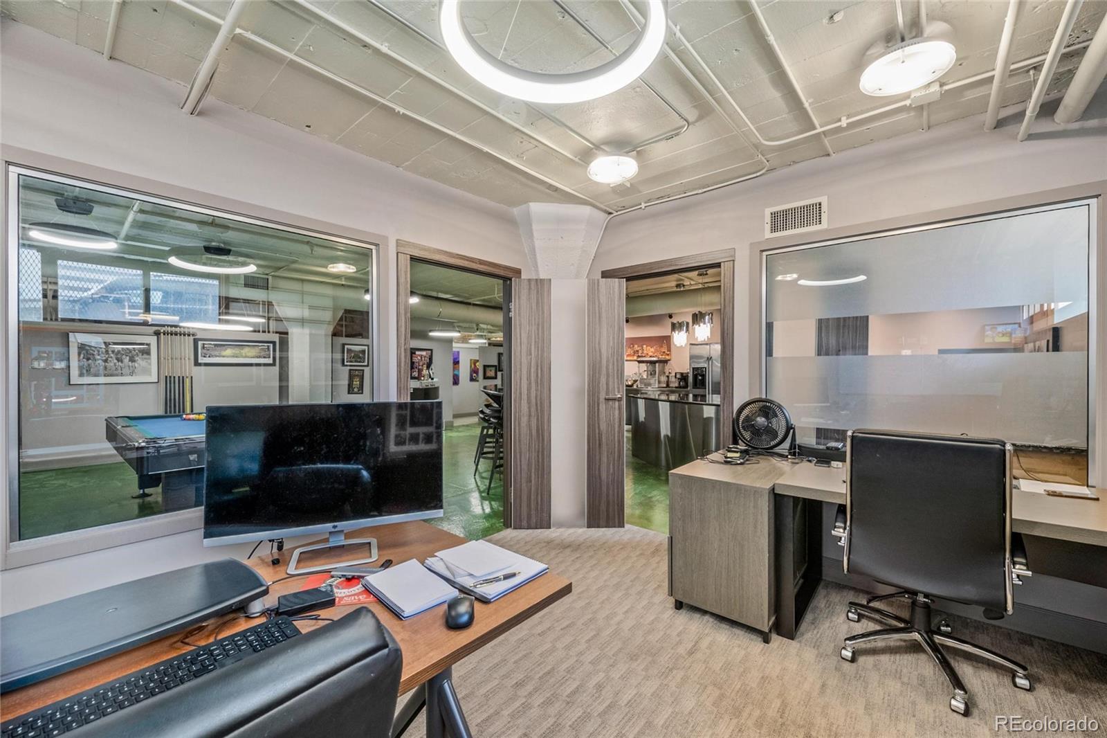 2000 Arapahoe Street, Unit 1 Denver, CO 80205 - Photo 19 of 32 a work room with furniture and a window