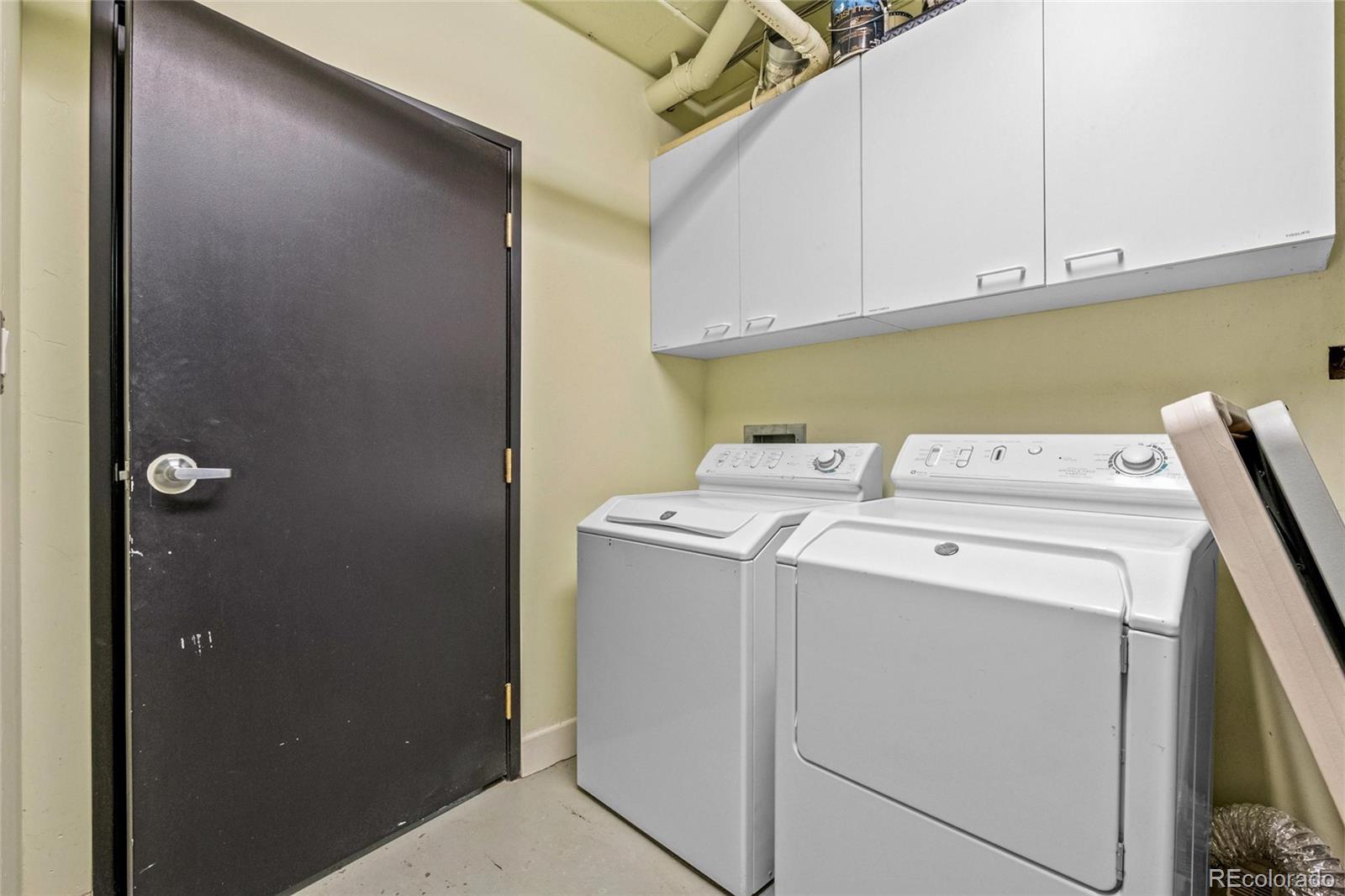 2000 Arapahoe Street, Unit 1 Denver, CO 80205 - Photo 28 of 32 a utility room with dryer and washer
