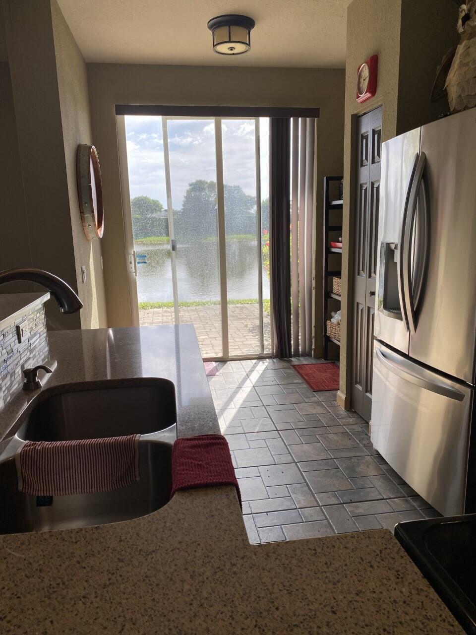 3143 Laurel Ridge Circle Riviera Beach, FL 33404 - Photo 7 of 32 thumbnail_IMG_4180