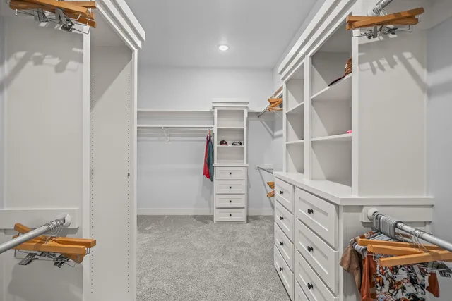 a view of a garden with a house