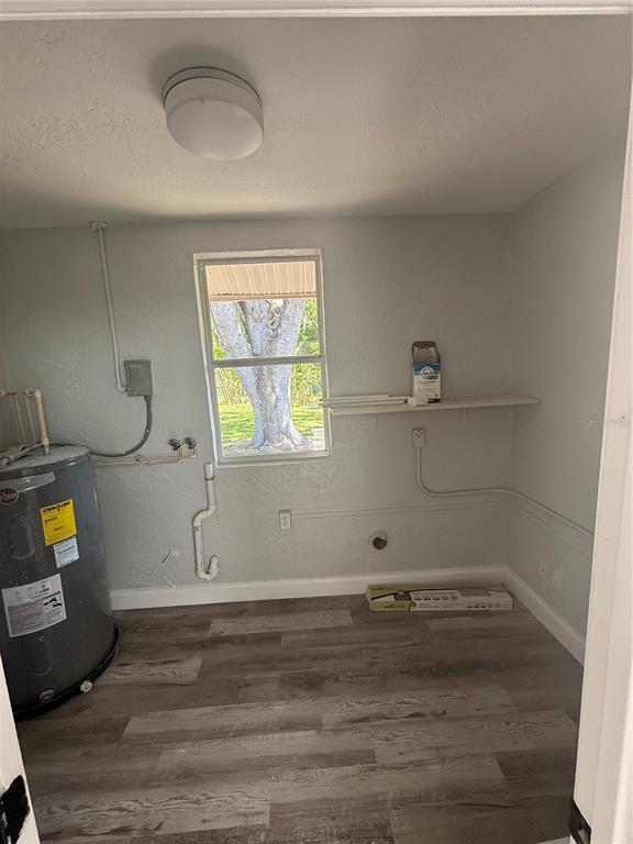 9029 Maiden Lane Aripeka, FL 34679 - Photo 8 of 11 a room with a window