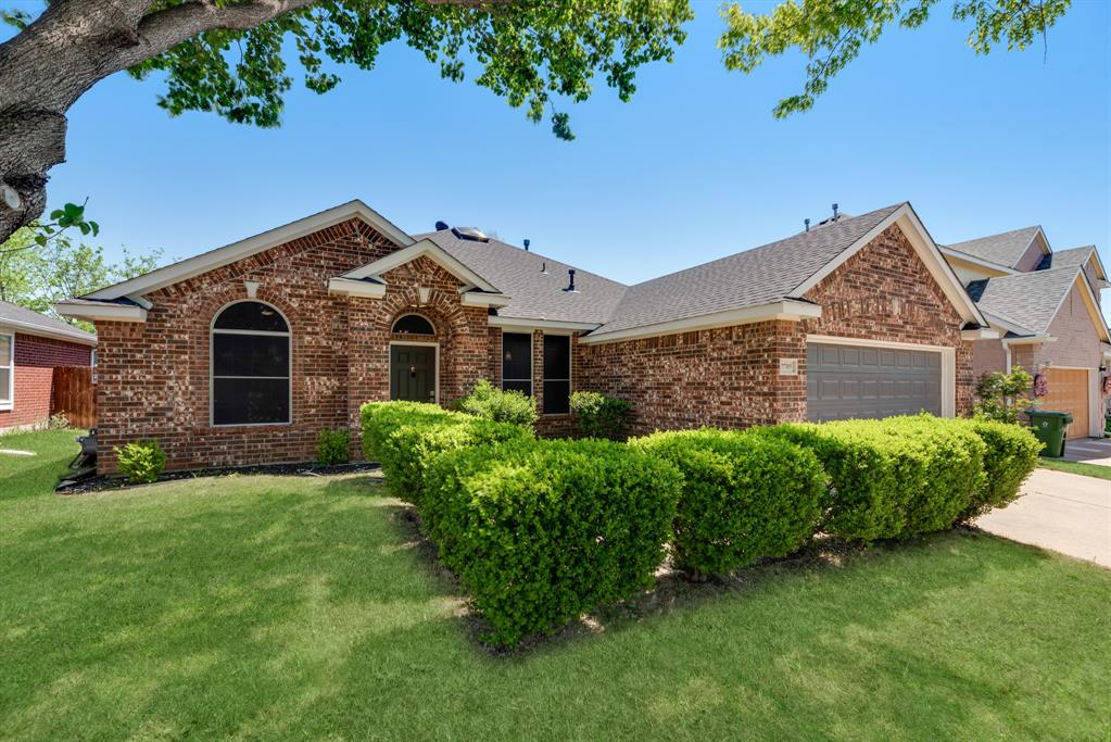 7705 Danuers Lane Arlington, TX 76002 - Photo 1 of 33 front view of a house with a yard