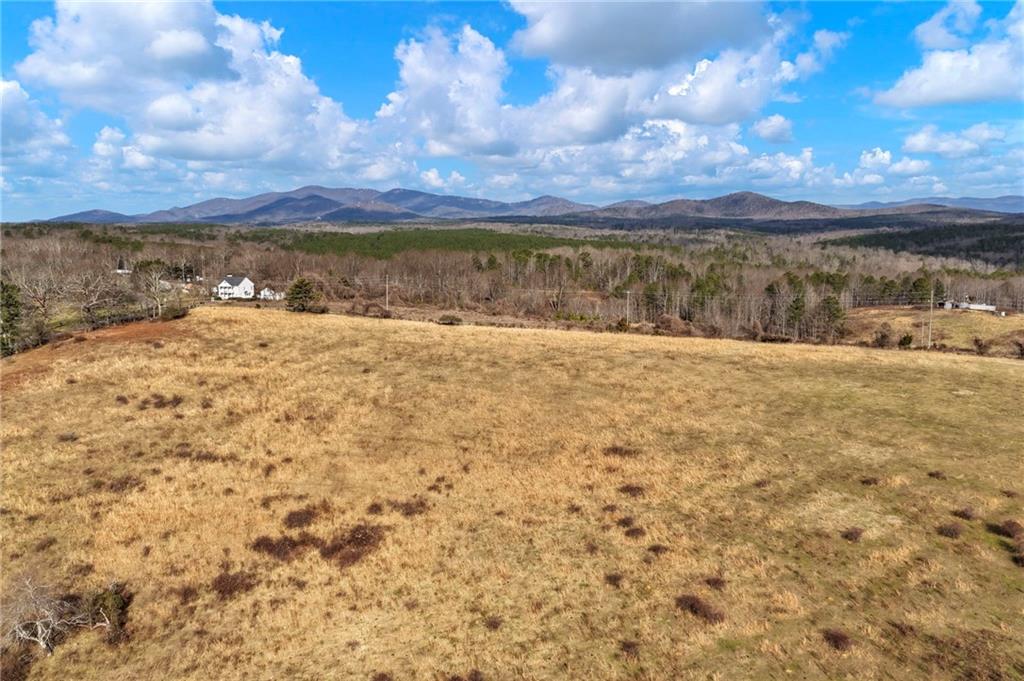 0 Eagles Perch Road Ball Ground, GA 30107 - Photo 12 of 28 a view of an ocean beach and mountain