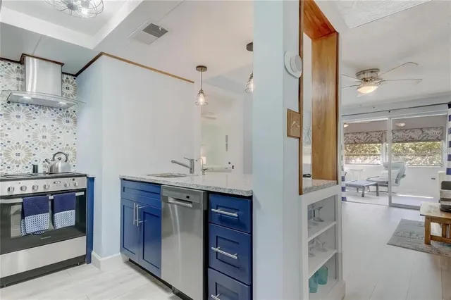 a spacious bathroom with double vanity and a mirror