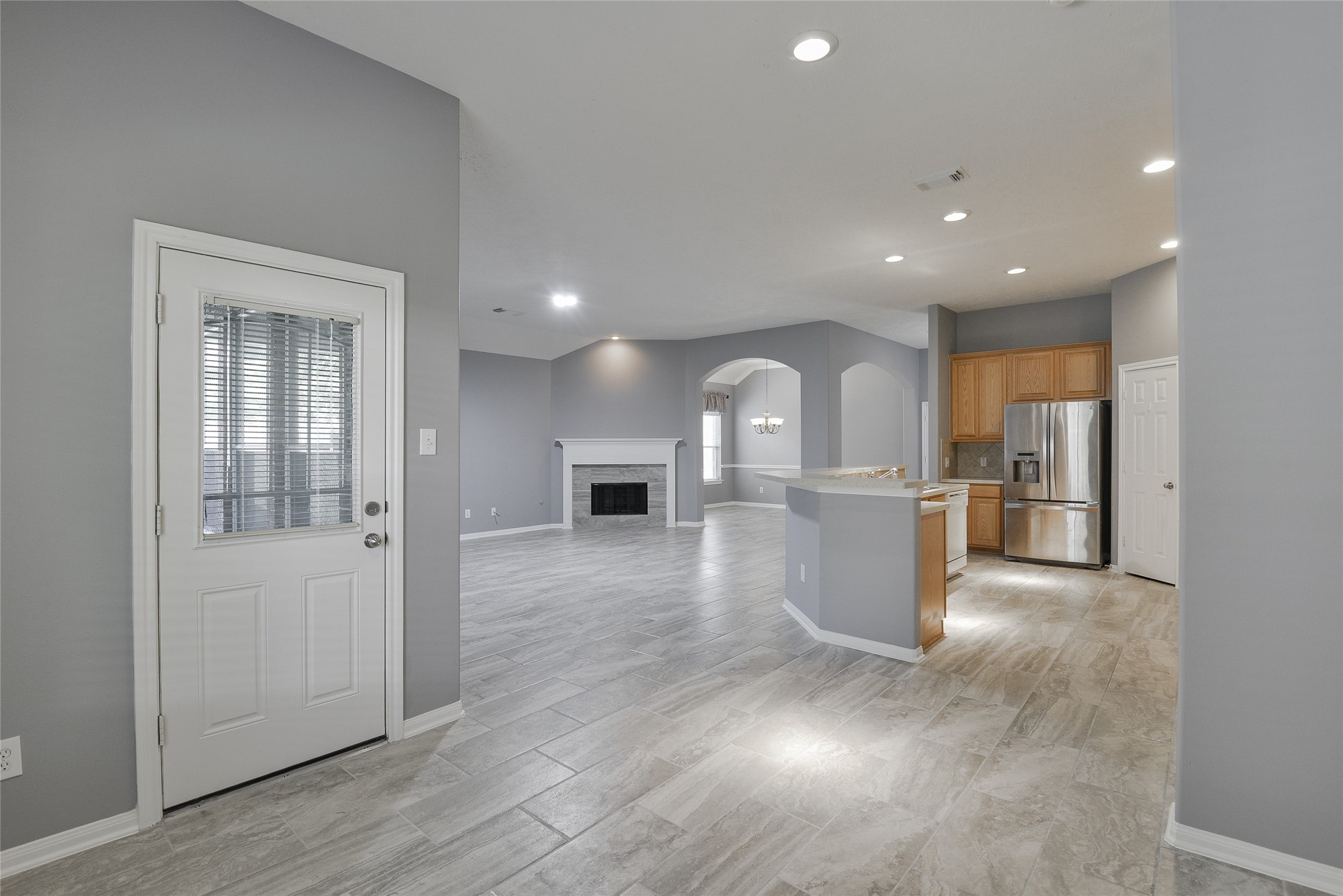 18411 Atasca Wds Trace Humble, TX 77346 - Photo 17 of 39 a view of a kitchen with a sink and cabinet with wooden floor