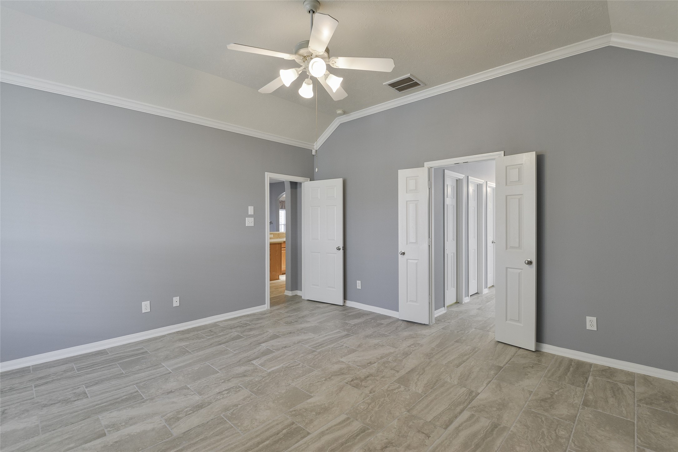 18411 Atasca Wds Trace Humble, TX 77346 - Photo 20 of 39 a view of an empty room with a fan