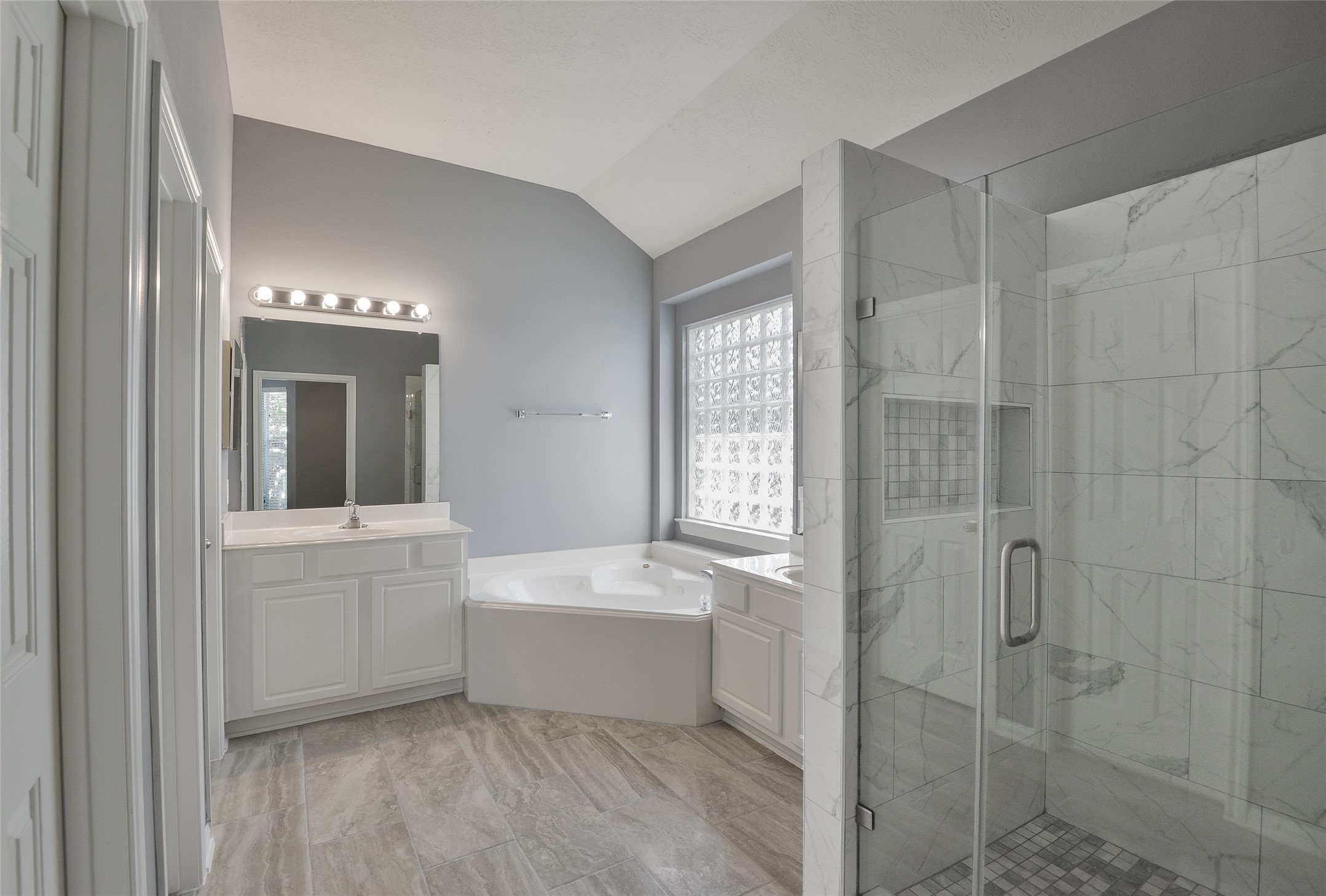 18411 Atasca Wds Trace Humble, TX 77346 - Photo 21 of 39 a bathroom with a sink a toilet and shower