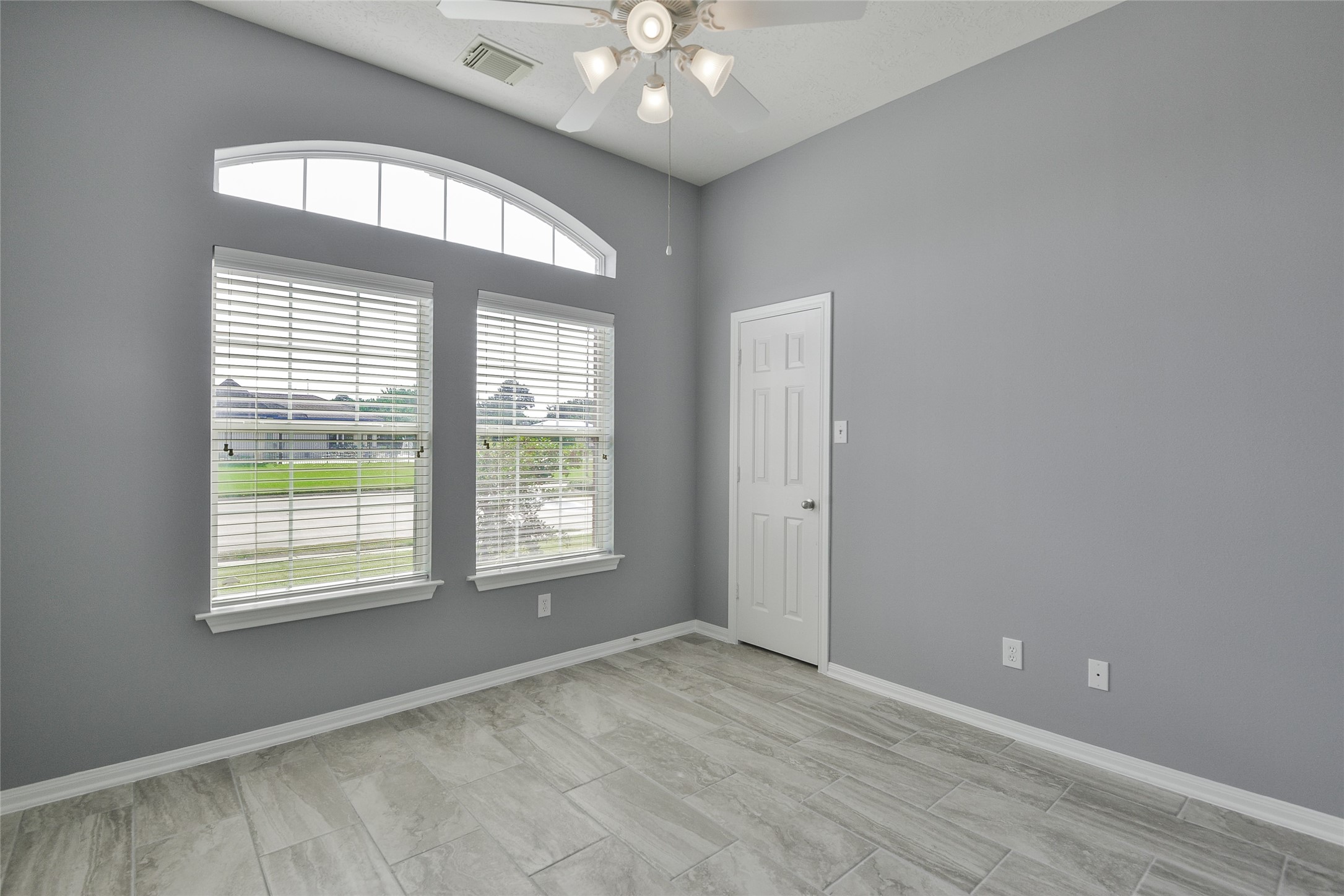18411 Atasca Wds Trace Humble, TX 77346 - Photo 32 of 39 a view of an empty room with a window