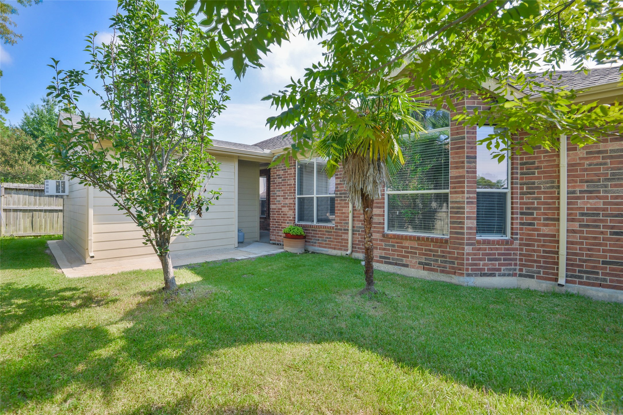 18411 Atasca Wds Trace Humble, TX 77346 - Photo 39 of 39 a view of house with a backyard