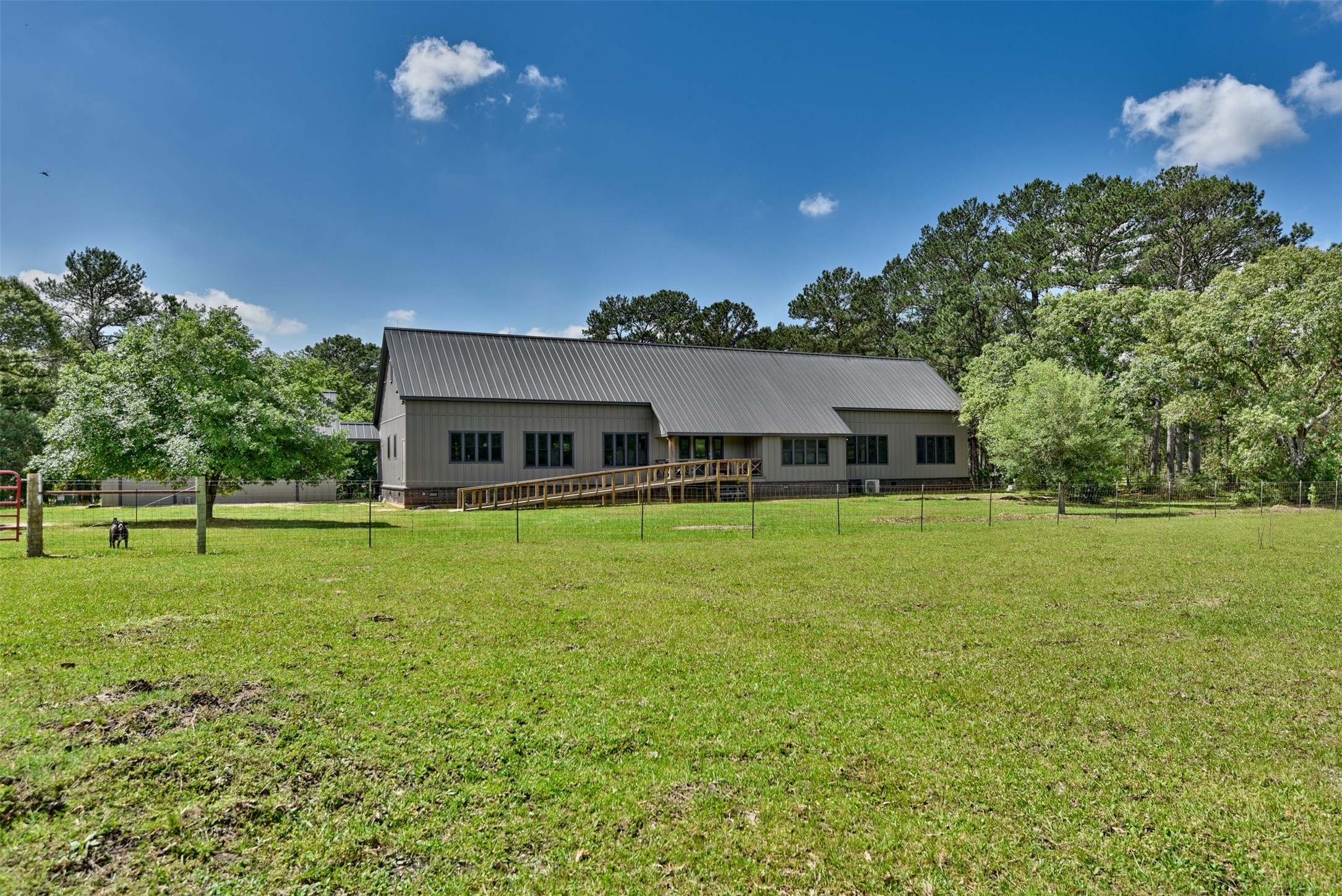 32023 Courtney Road Navasota, TX 77868 - Photo 23 of 37 a front view of a house with a garden