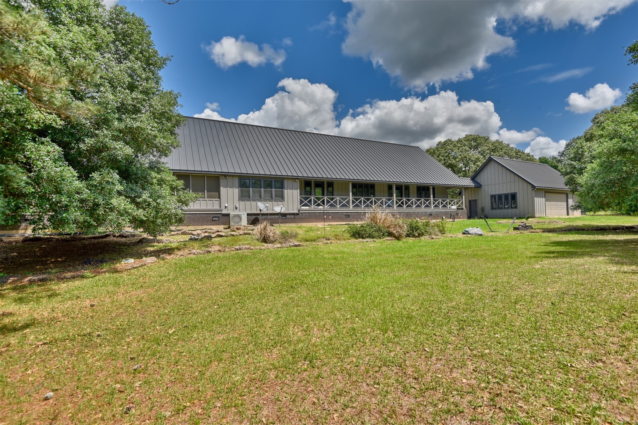 32023 Courtney Road Navasota, TX 77868 - Photo 24 of 37 a view of a house with swimming pool yard and outdoor seating