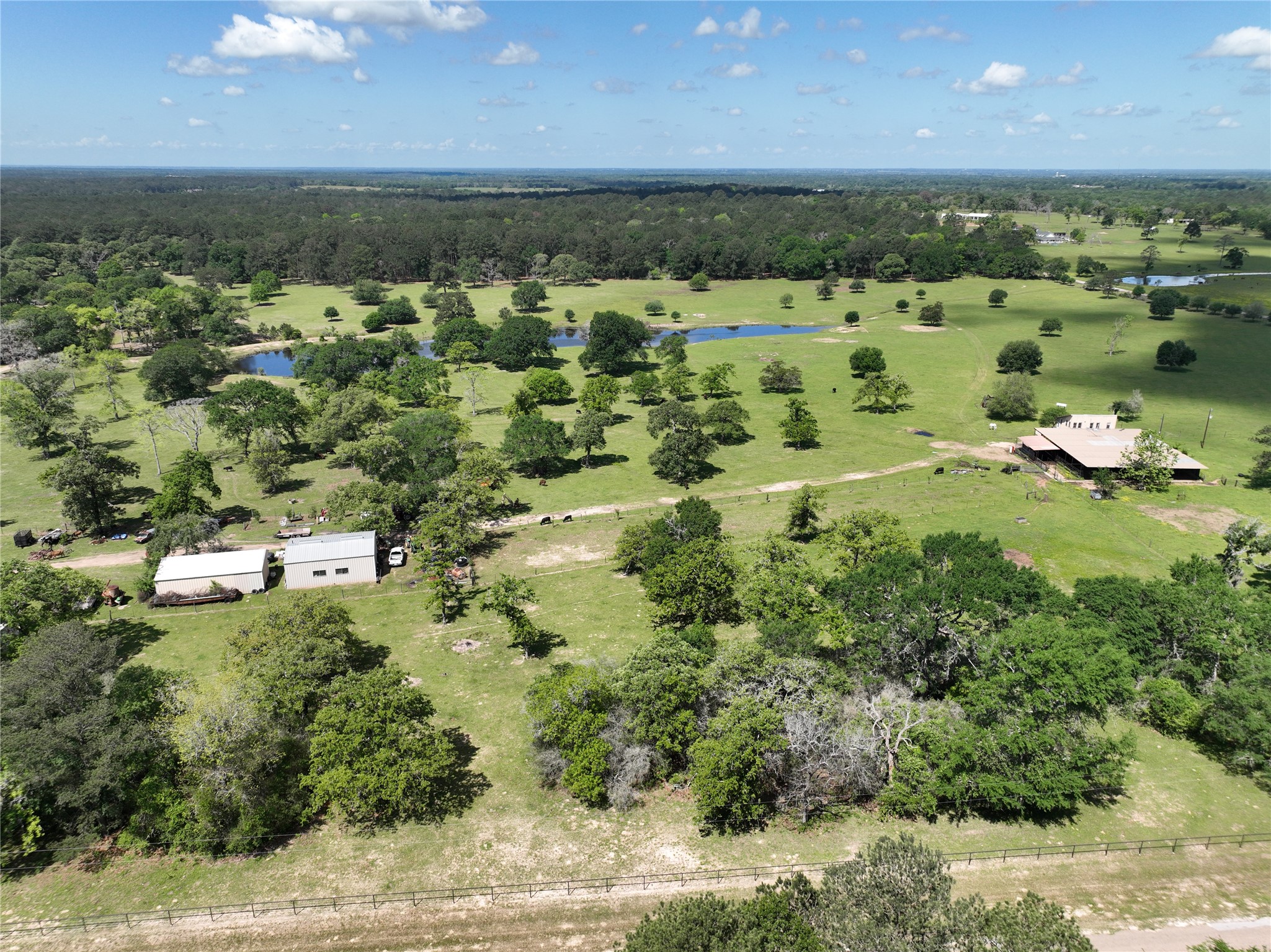 32023 Courtney Road Navasota, TX 77868 - Photo 5 of 37 an aerial view of a houses with a yard